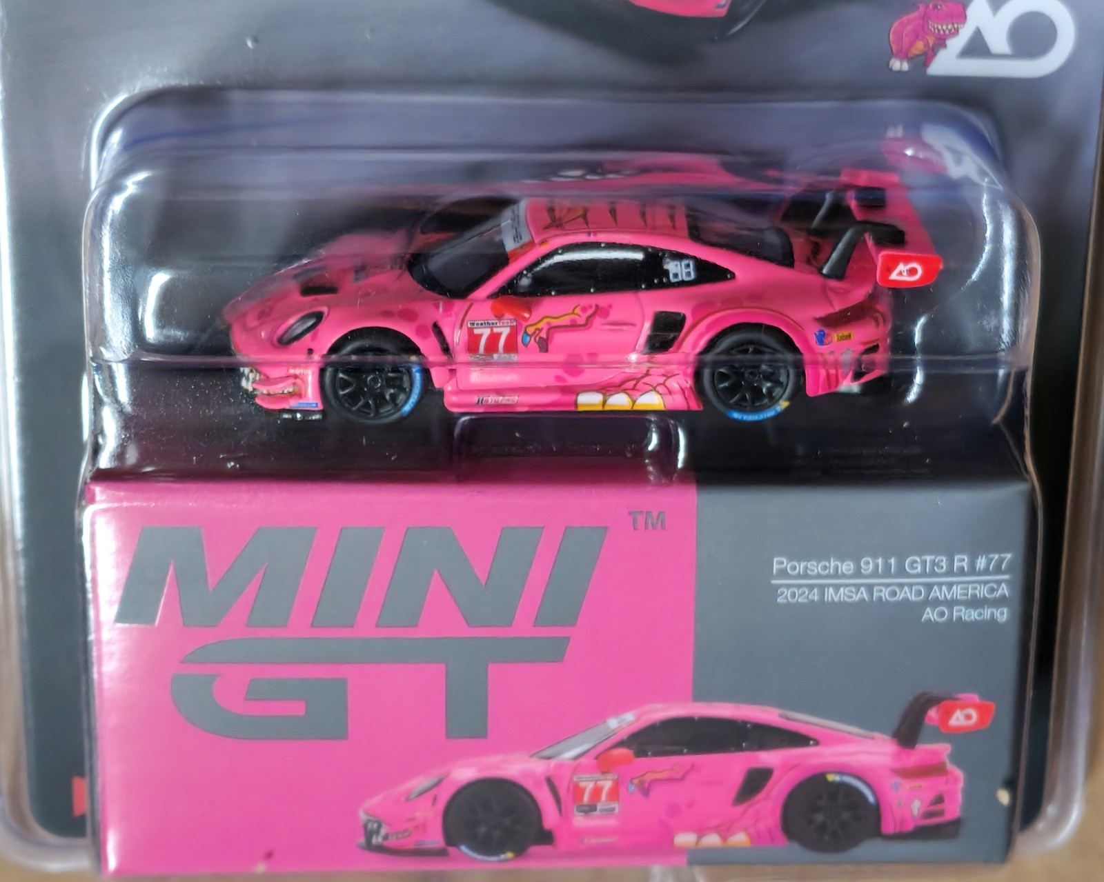 Mini GT 1:64 Porsche 911 GT3 R #77 AO Racing 2024 IMSA ROAD AMERICA
