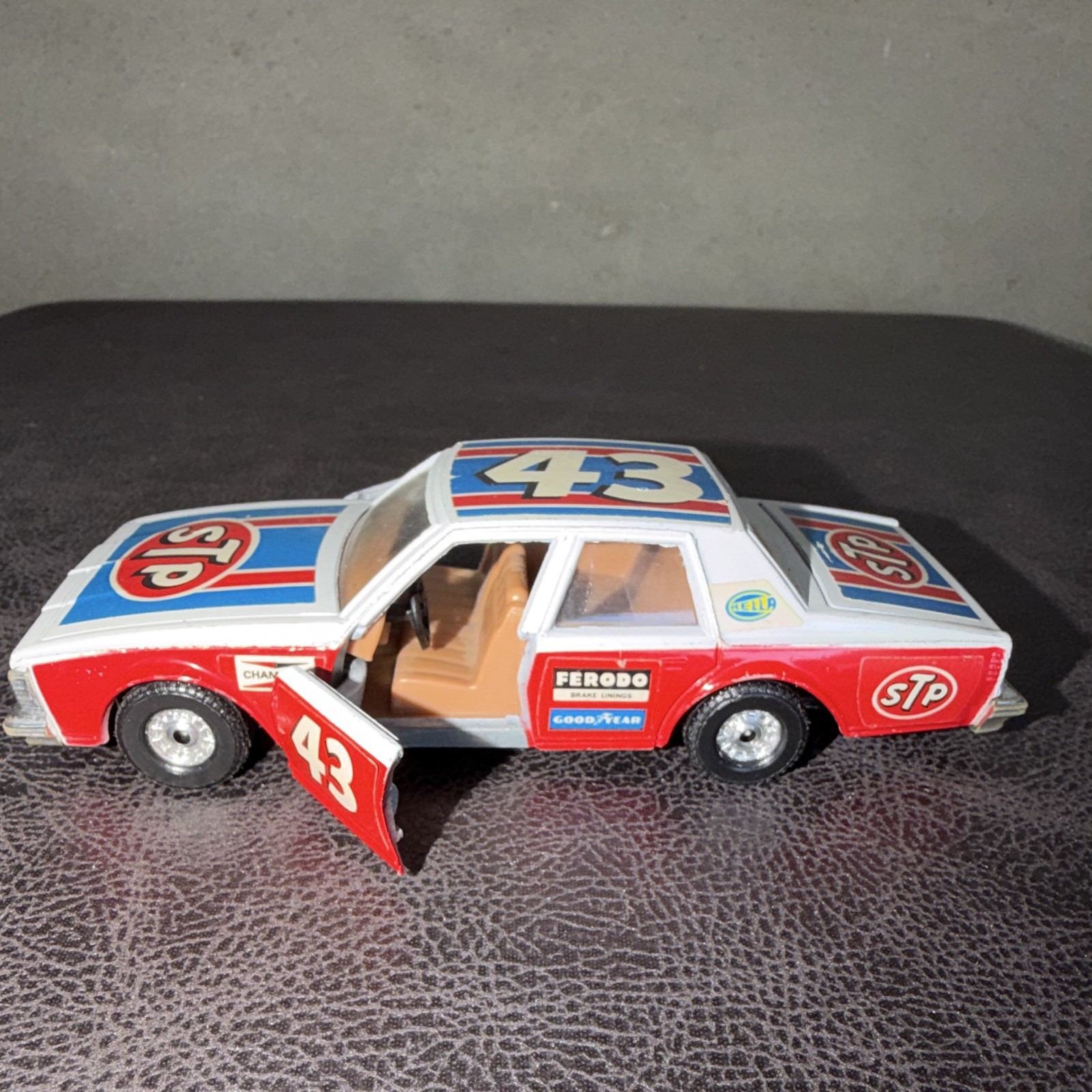 Corgi 1978 Chevrolet Caprice Classic 1:36 Diecast STP Opening Doors