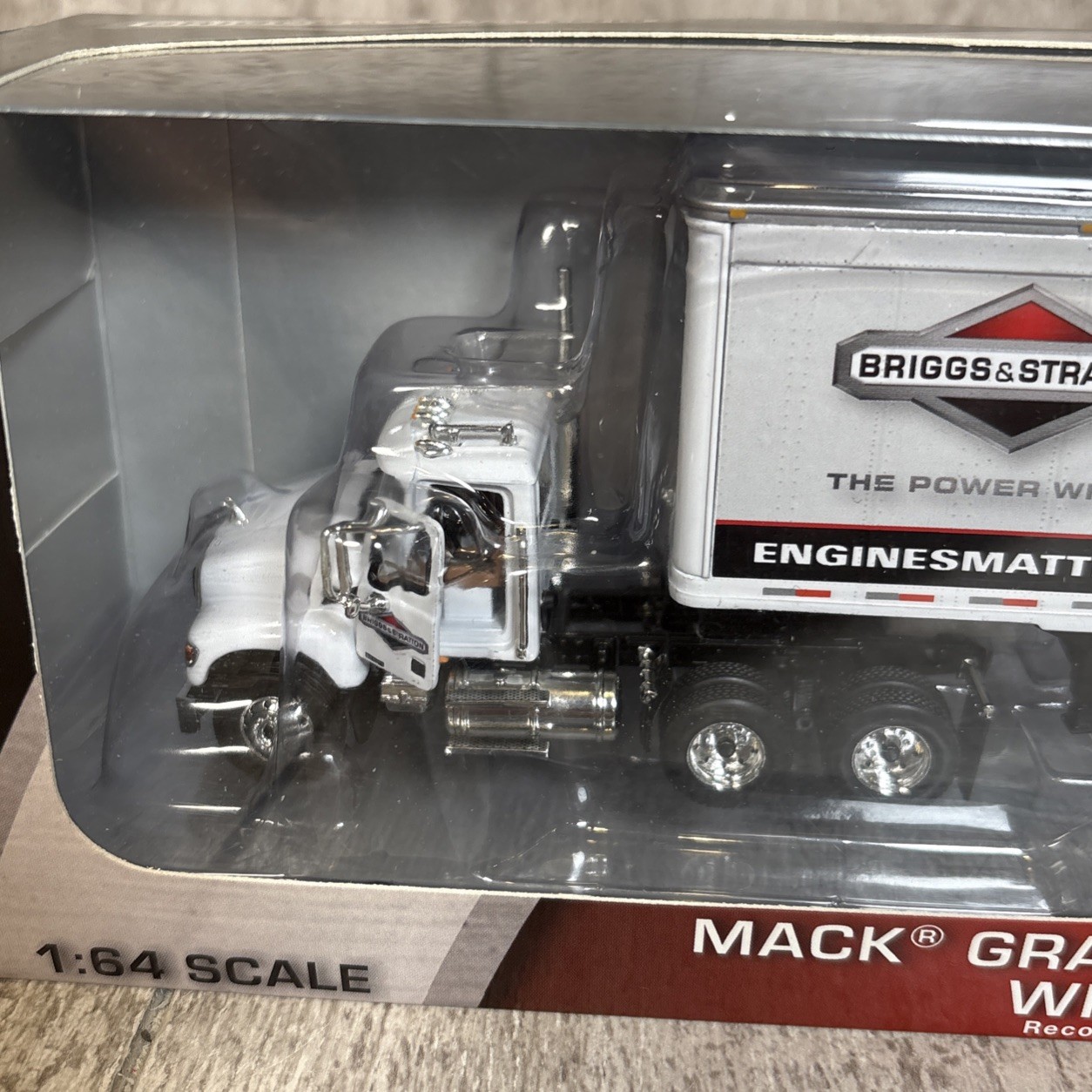 1/64 First Gear Briggs & Stratton Mack Granite Day-Cab Tractor w/ Pup Trailer