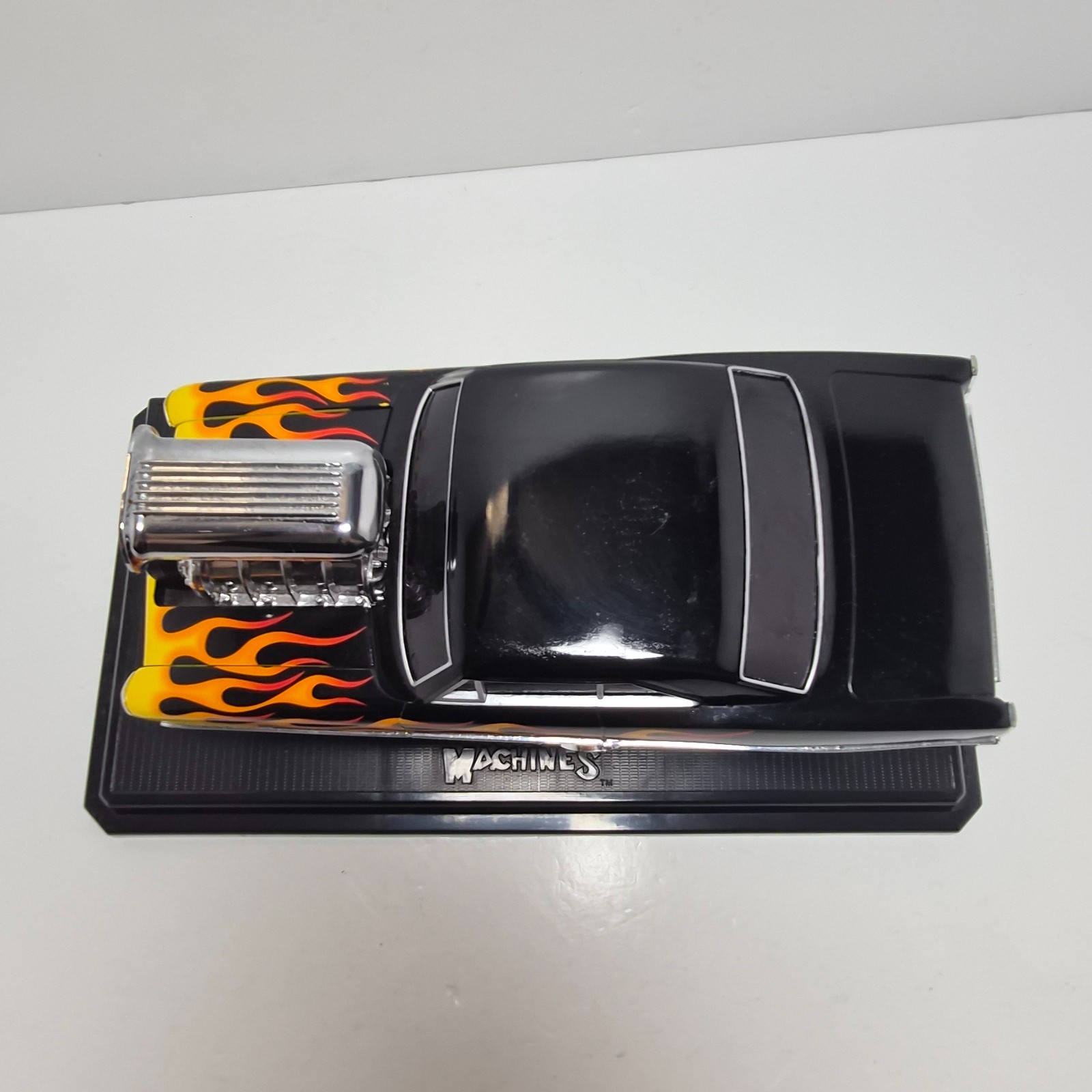 Muscle Machines 1967 Chevy Nova Black Flames 1:18 Diecast w/ Base