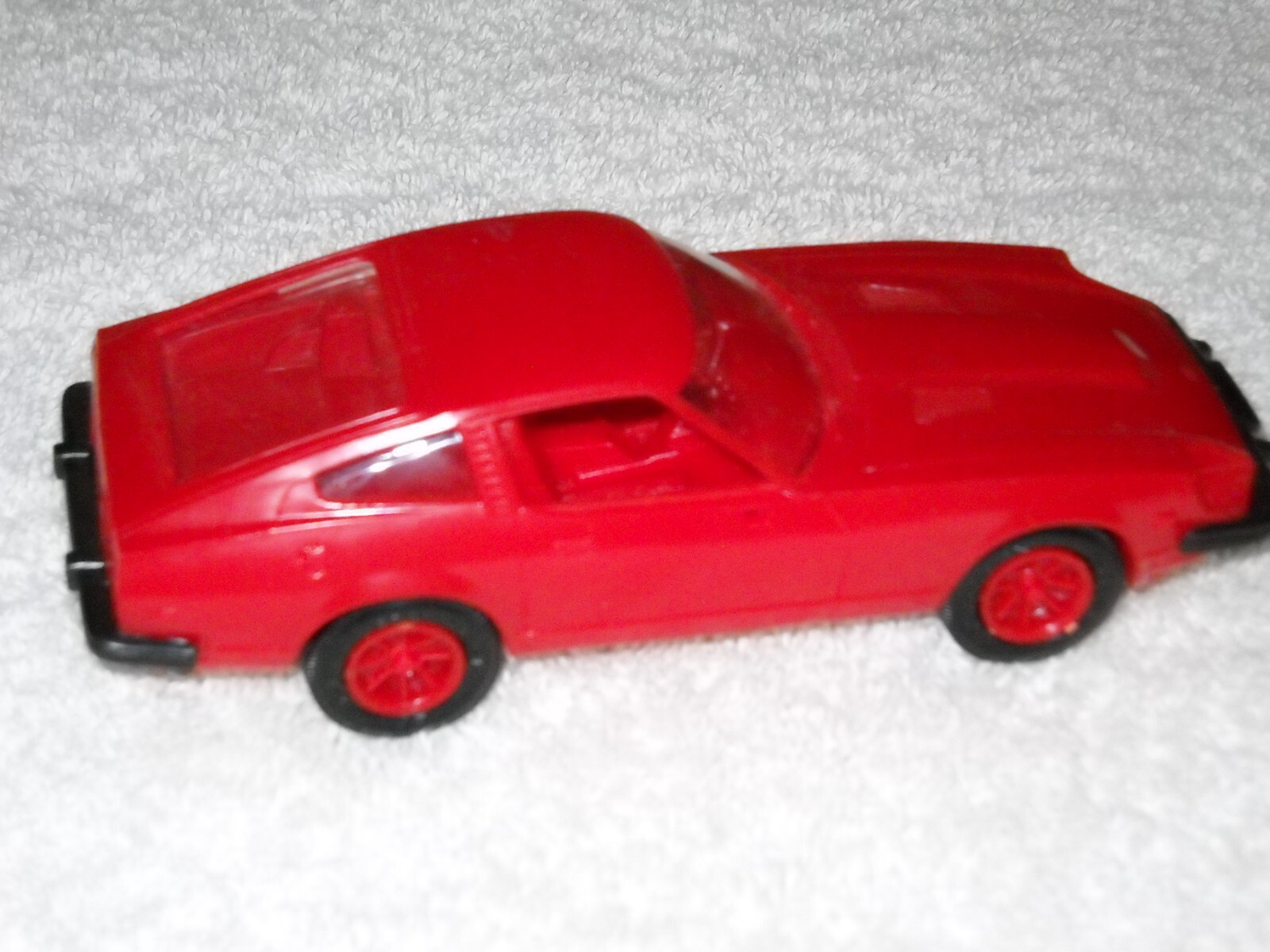 MMI Plastic 1980 Red Car, Nissan, Good Condition, Please see the photos