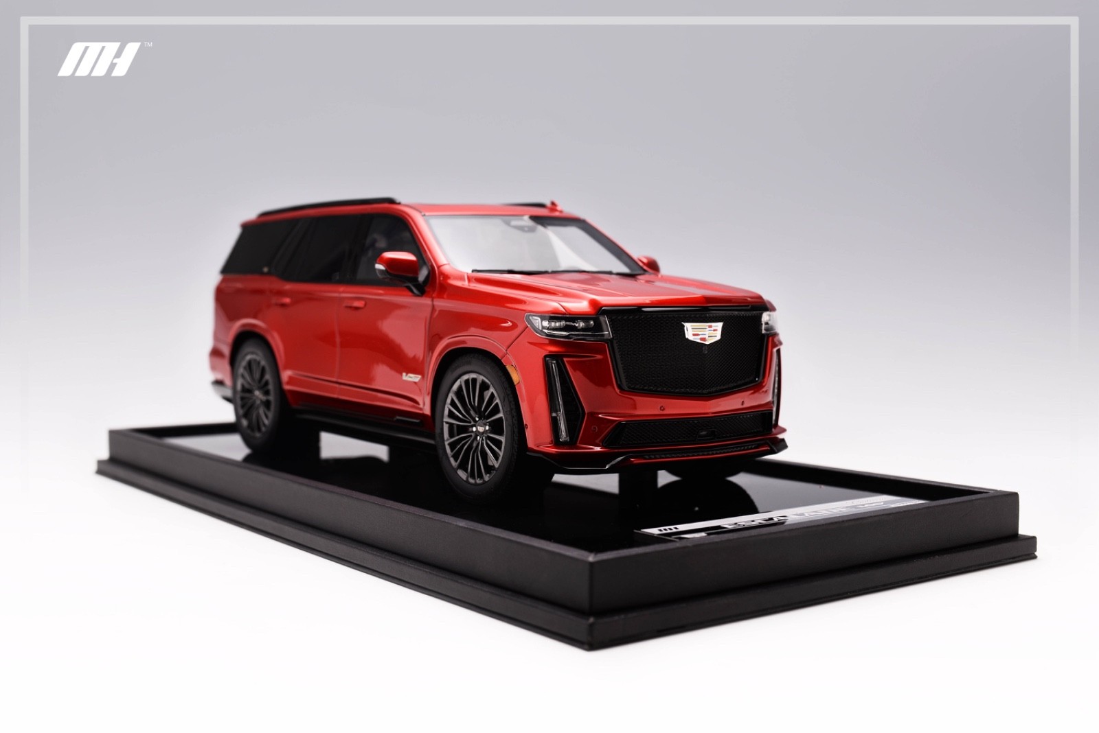 1/18 Motorhelix Cadillac Escalade V from 2022 in in red on Carbon Base