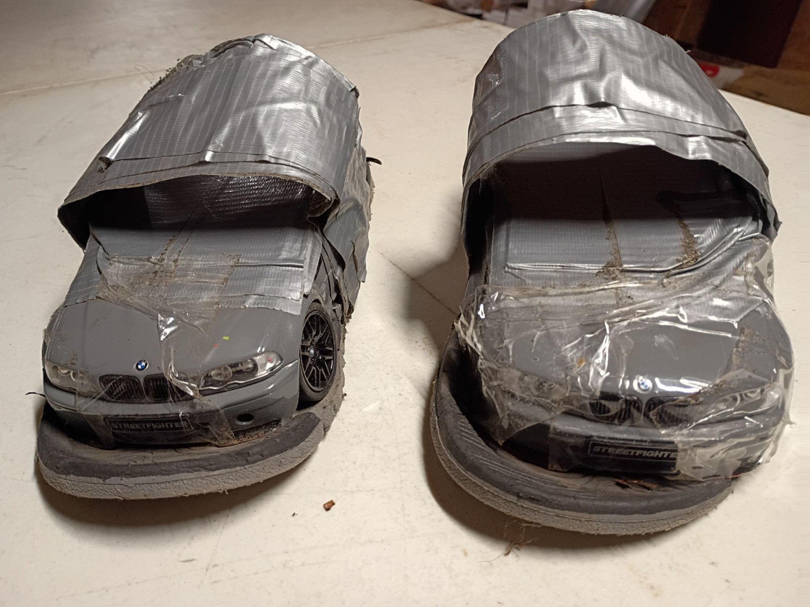 pair of Solido 2000 BMW E46 M3 Grey 1:18 flip flops crushed cars