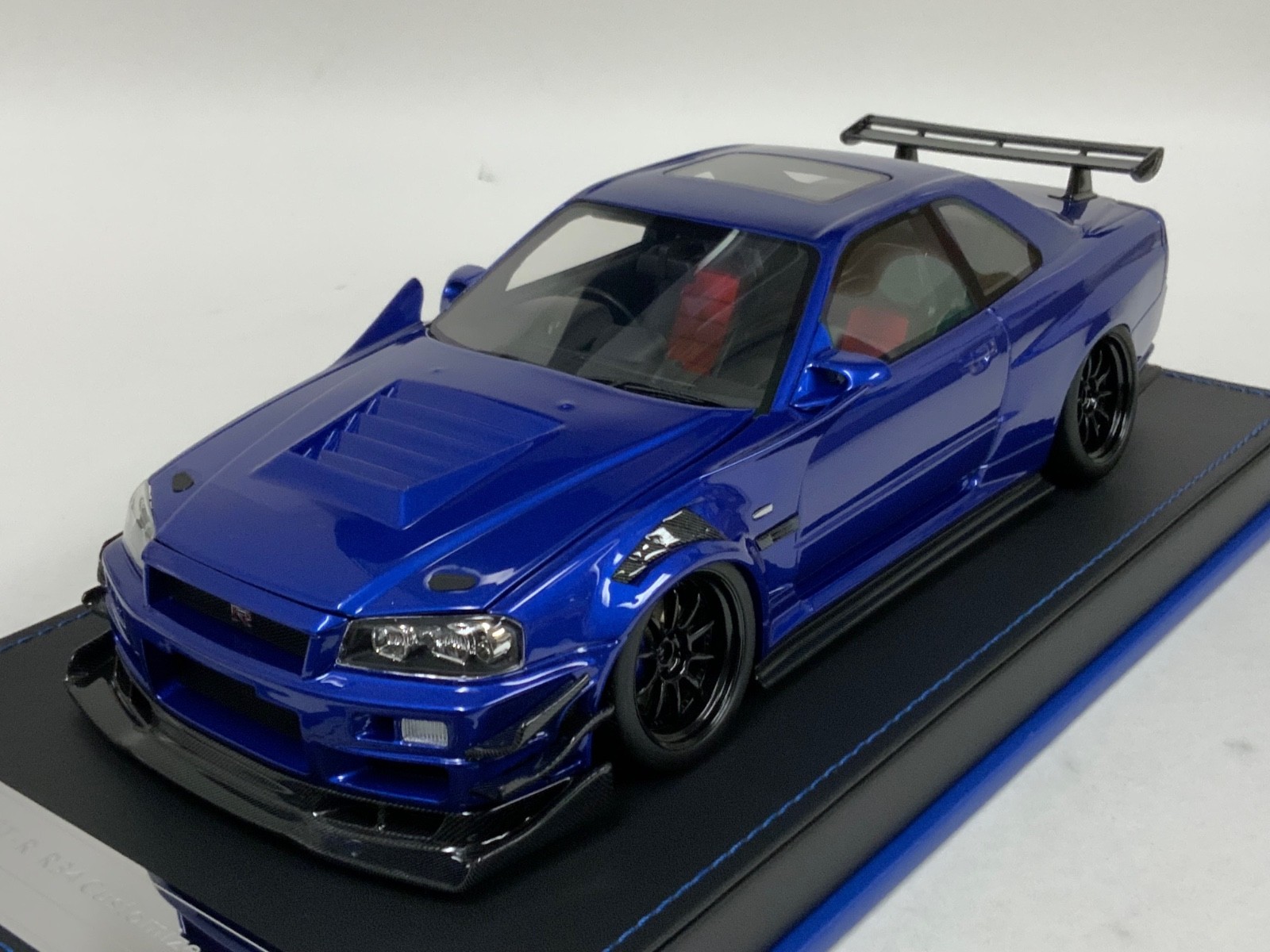1/18 IVY Nissan R34 customized with Full Engine Blue leather base 20 pieces