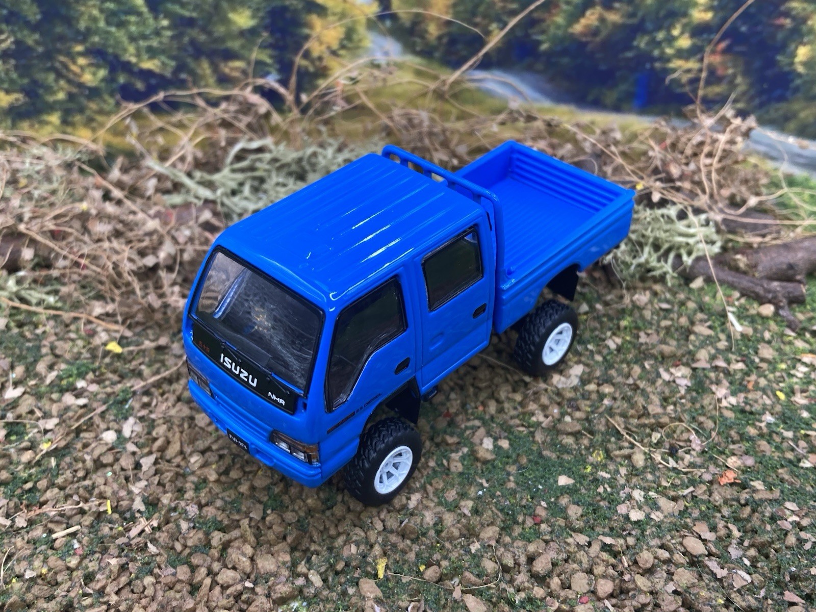 Isuzu NHR Lifted 4×4 Pickup Truck 1/64 Scale Massdi Diecast Custom Model1