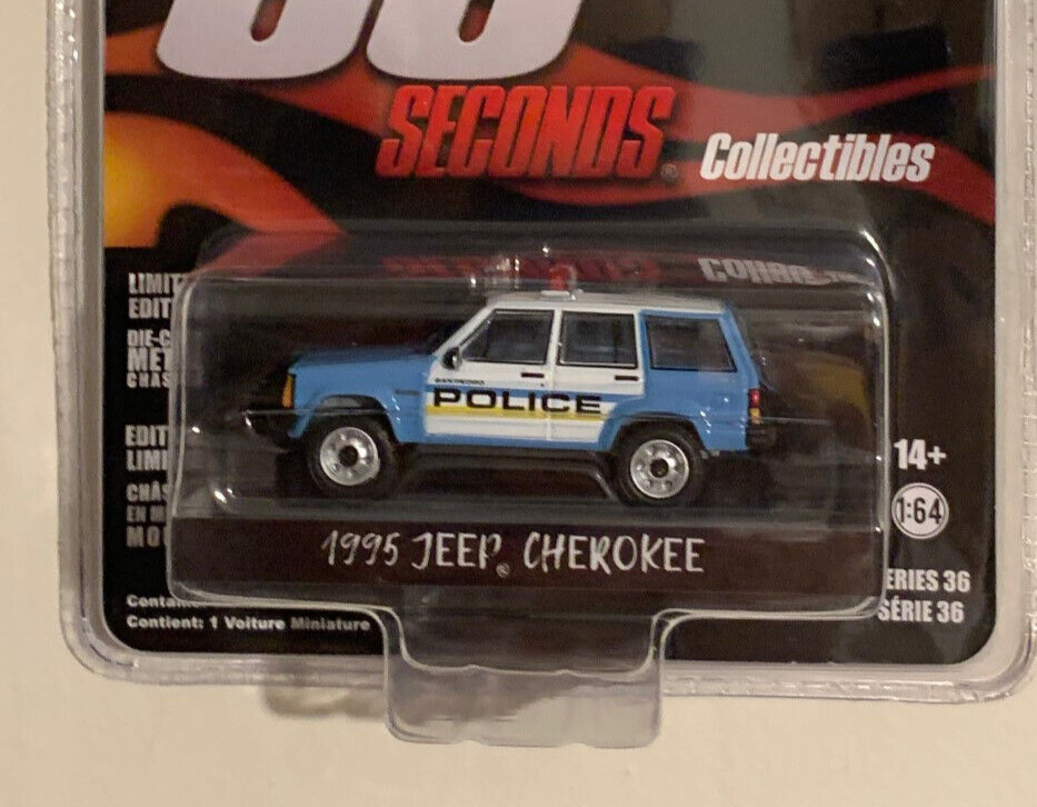 N51 GREENLIGHT 1995 Jeep Cherokee Light Blue and White San Pedro Police 44960 E