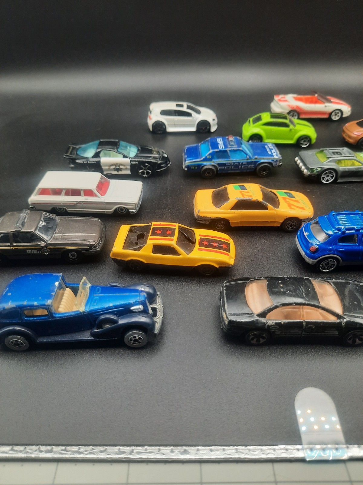 Mixed lot of 17 hot wheels/matchbox cars. Vintage to modern. Most fair shape.