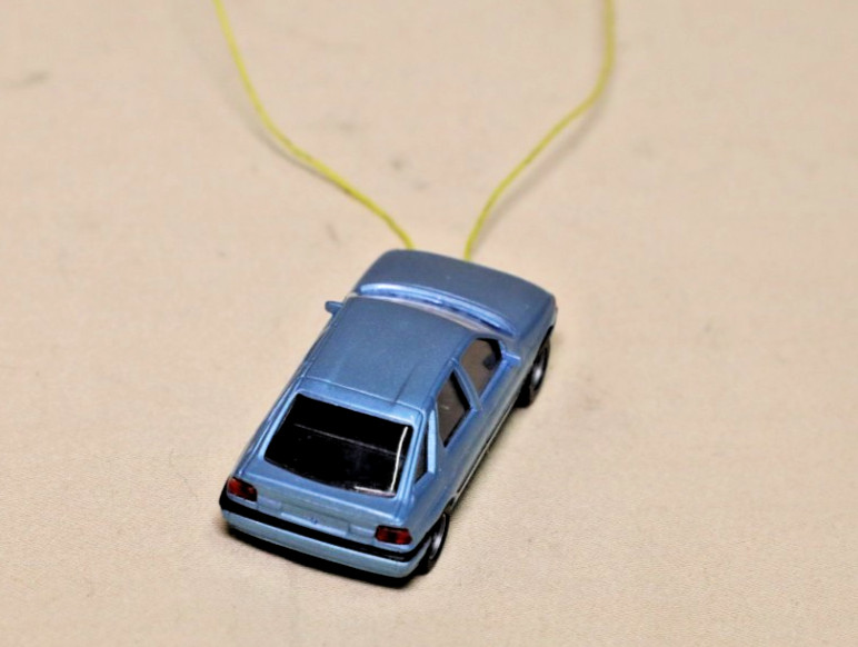 Busch HO Ford Escort Ghia 12V lighted – no box