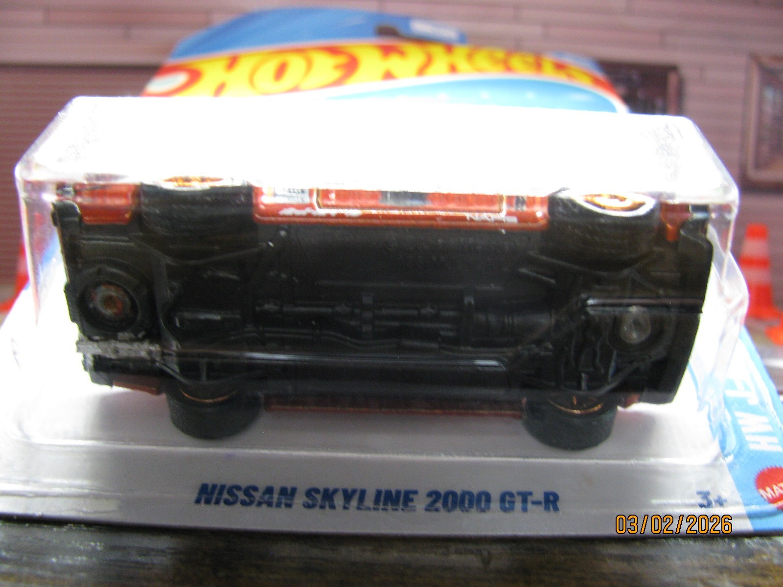 2026 Hot Wheels Burnt Orange Nissan Skyline 2000 GT-R, w/Real Riders Wheel Swap