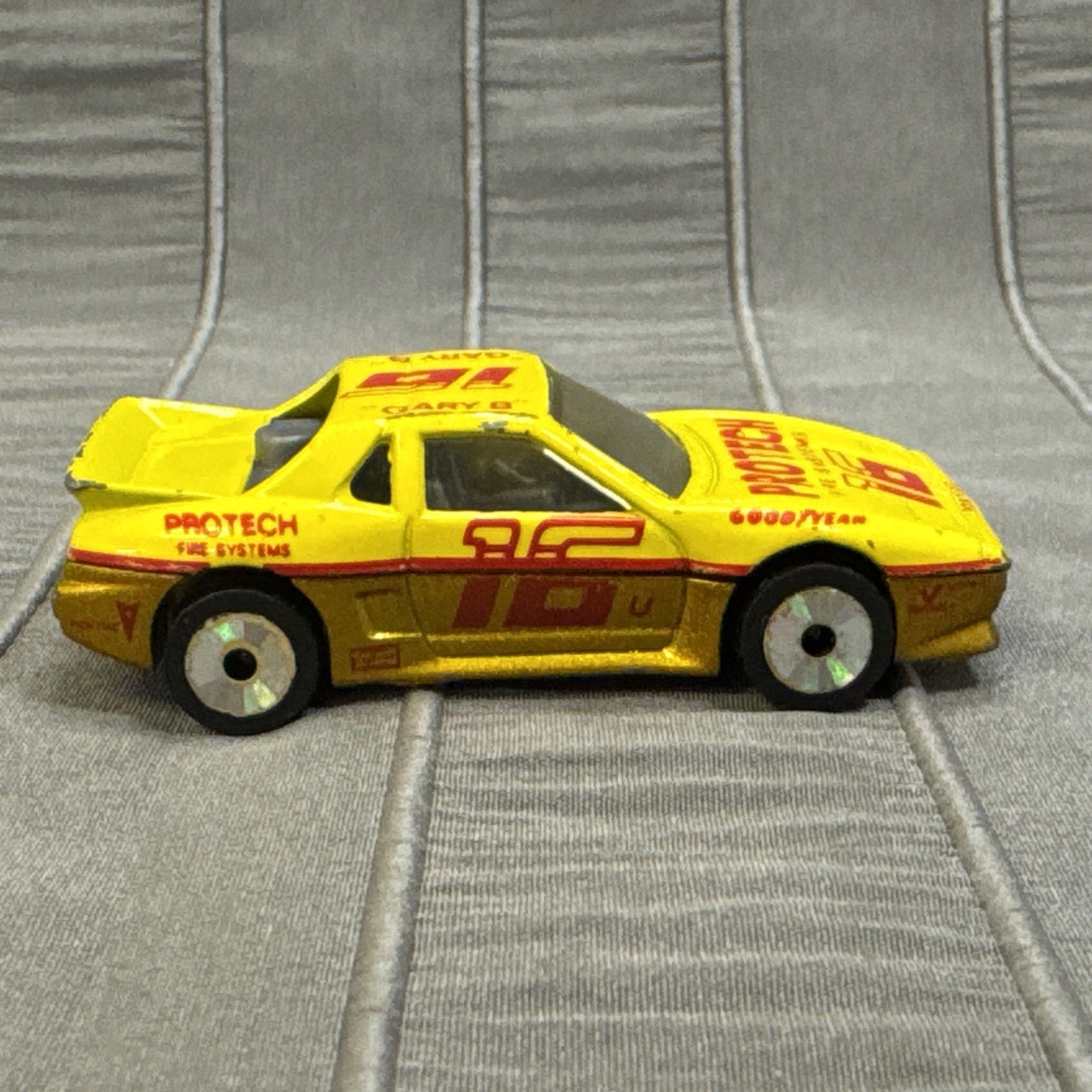 Matchbox Pontiac Fiero, Yellow, #16 Protech Fire Systems