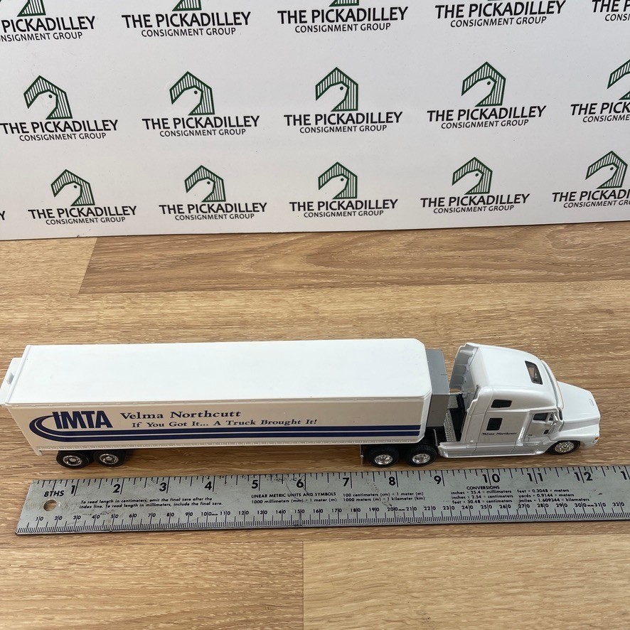 SpecCast Freightliner Century Class IMTA Velma Northcutt 1/64 Diecast Semi Truck