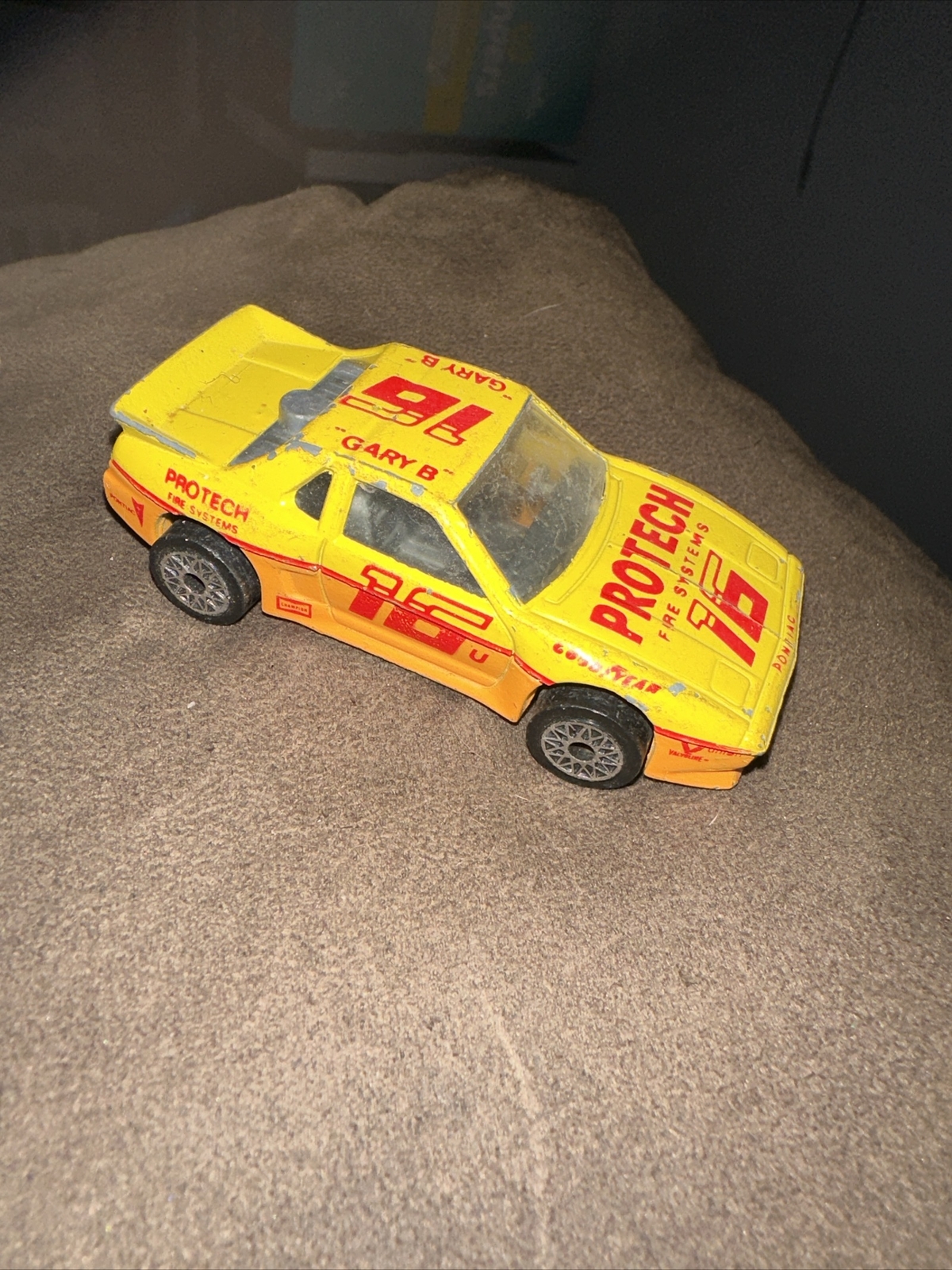 1985 Matchbox SuperFast SF19 Pontiac Fiero #16 ProTech Fire Systems Yellow LOOSE