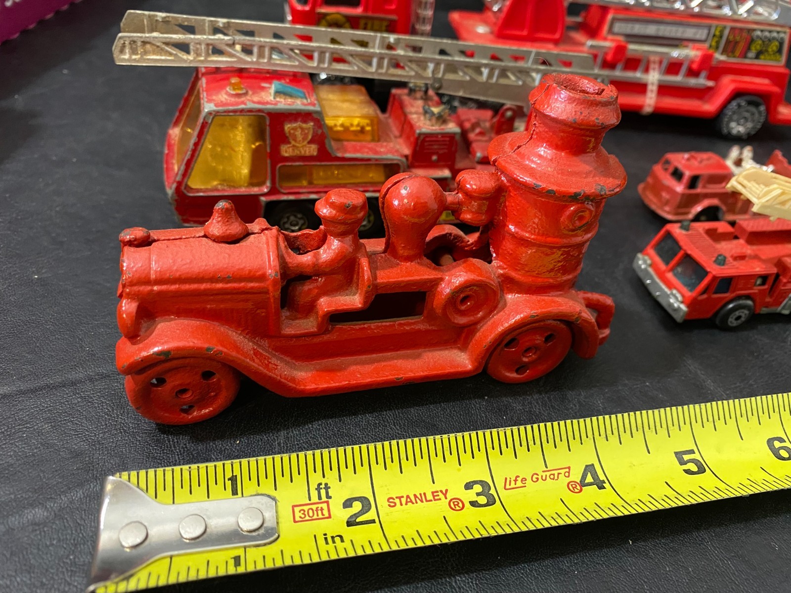 fire department collectibles cast iron Matchbox w/ belt buckle figure and more!