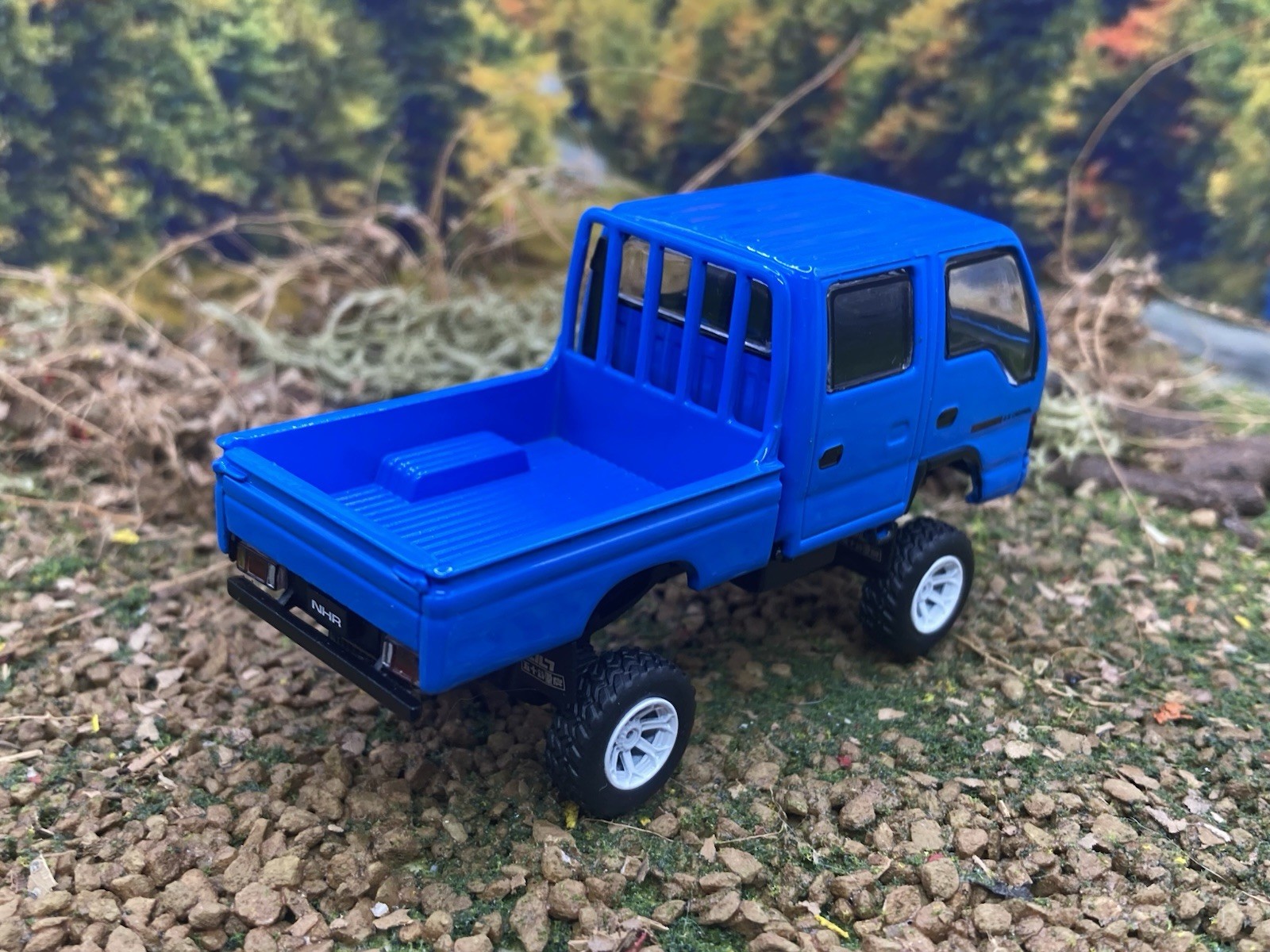 Isuzu NHR Lifted 4×4 Pickup Truck 1/64 Scale Massdi Diecast Custom Model1