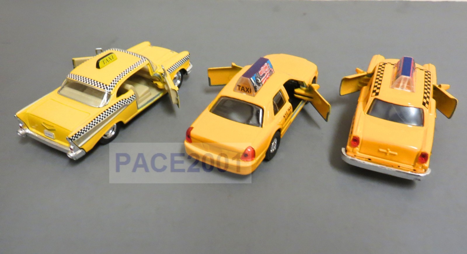 Lot of 3 Diecast Taxies with Pullback Action (57 Bel Air, Classic and Modern)