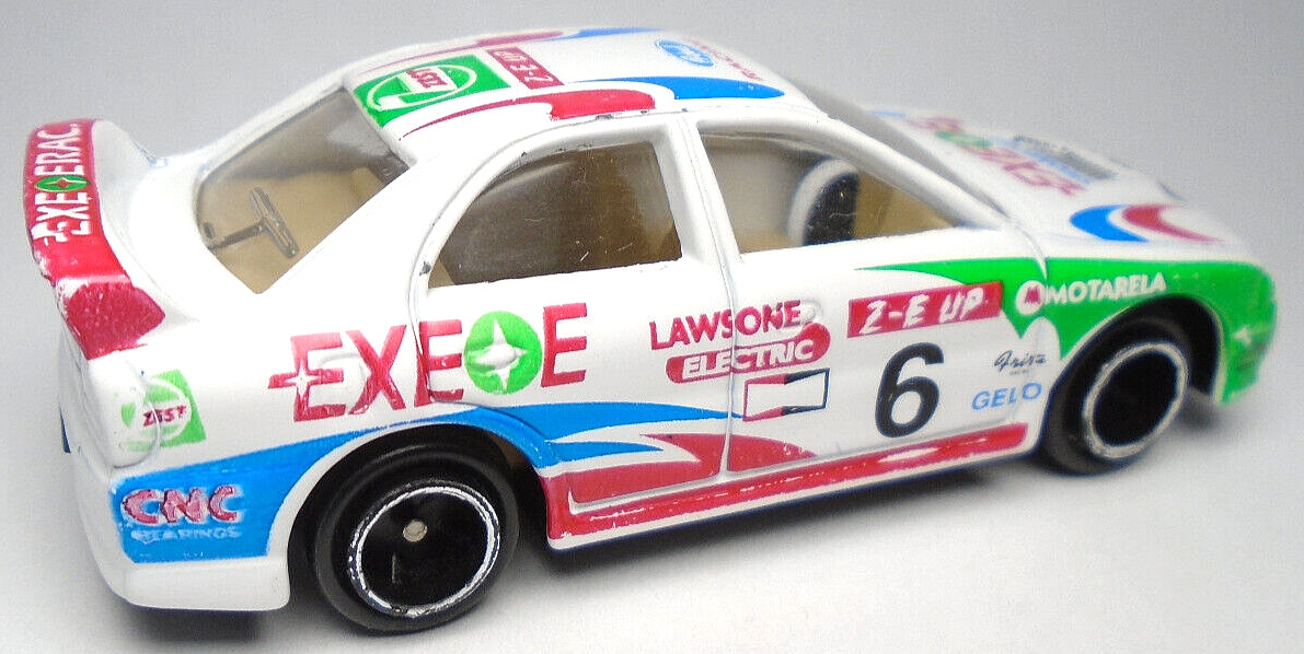 EXEOE WONROW MOTARELA #6 WHITE 1:64 DIECAST 3″ RACE CAR W GREEN RED & BLUE CHINA