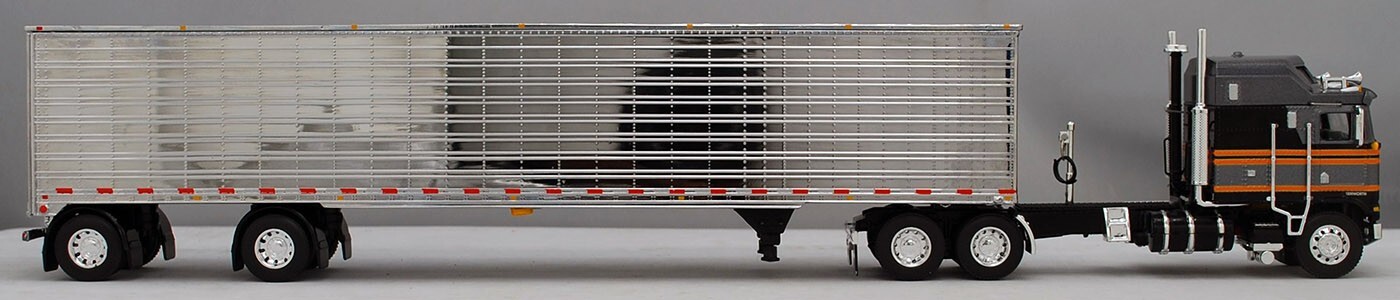 DCP 1/64 60-1559 SILVER BLACK KENWORTH K100AERODYNE LONG FRAME W/MATCHING VANNIB
