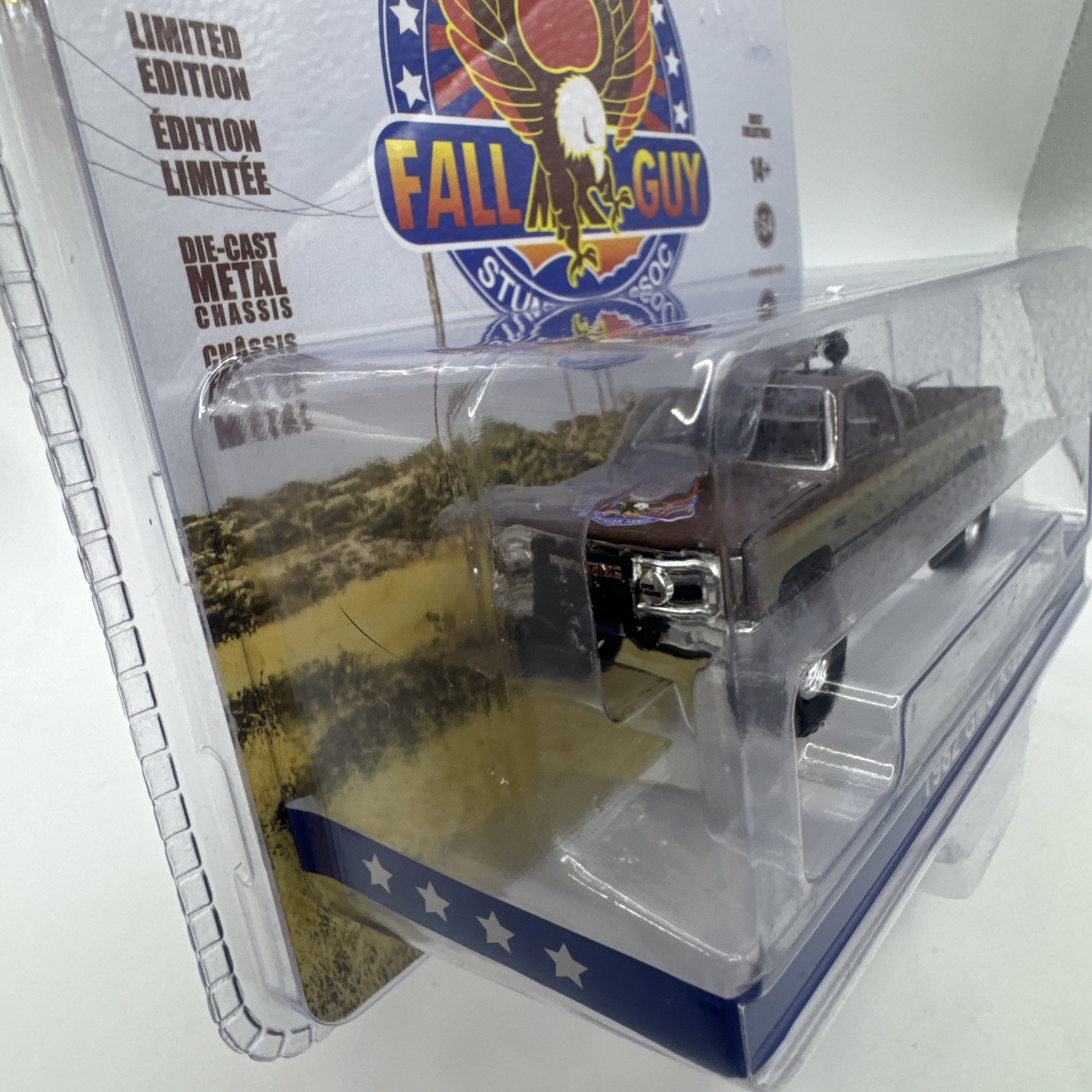 Greenlight Fall Guy Stuntman Assoc 1982 GMC K-2500 Sierra Grande 1/64