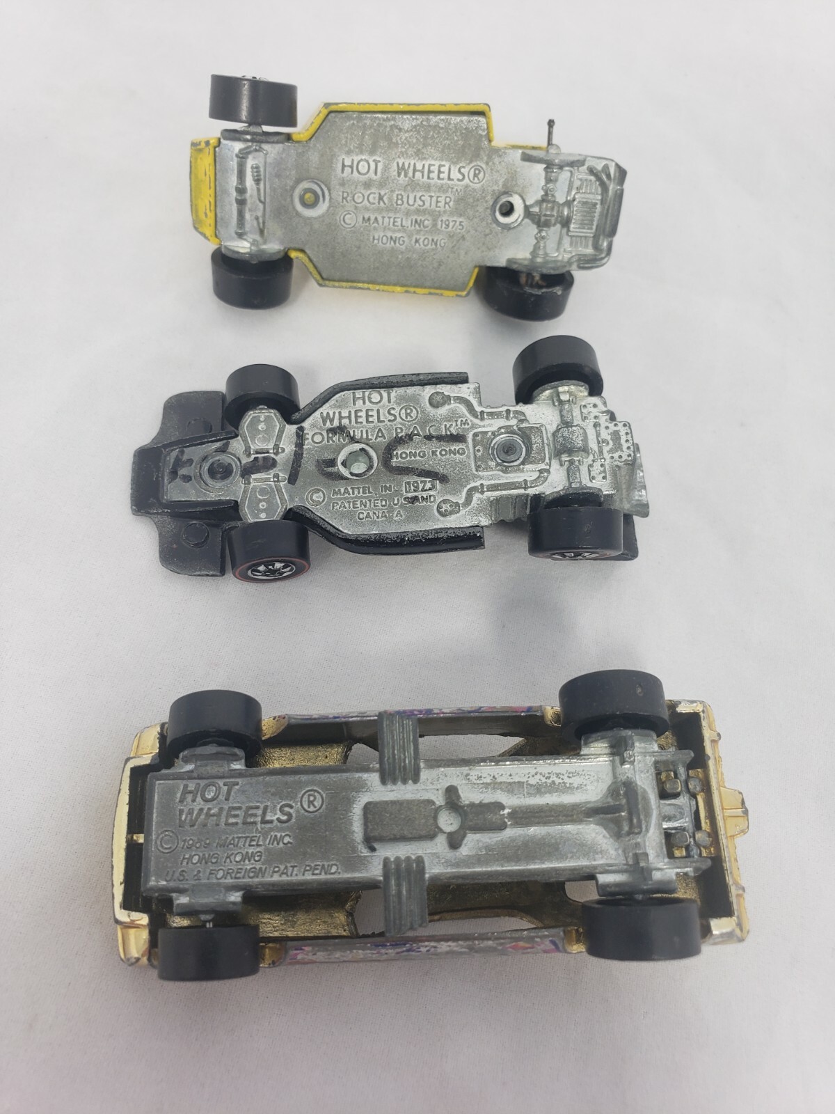 Lot of 3 Vintage Hotwheels. 1969 – 1975 Hemi Hauler, Redline, Rock Buster