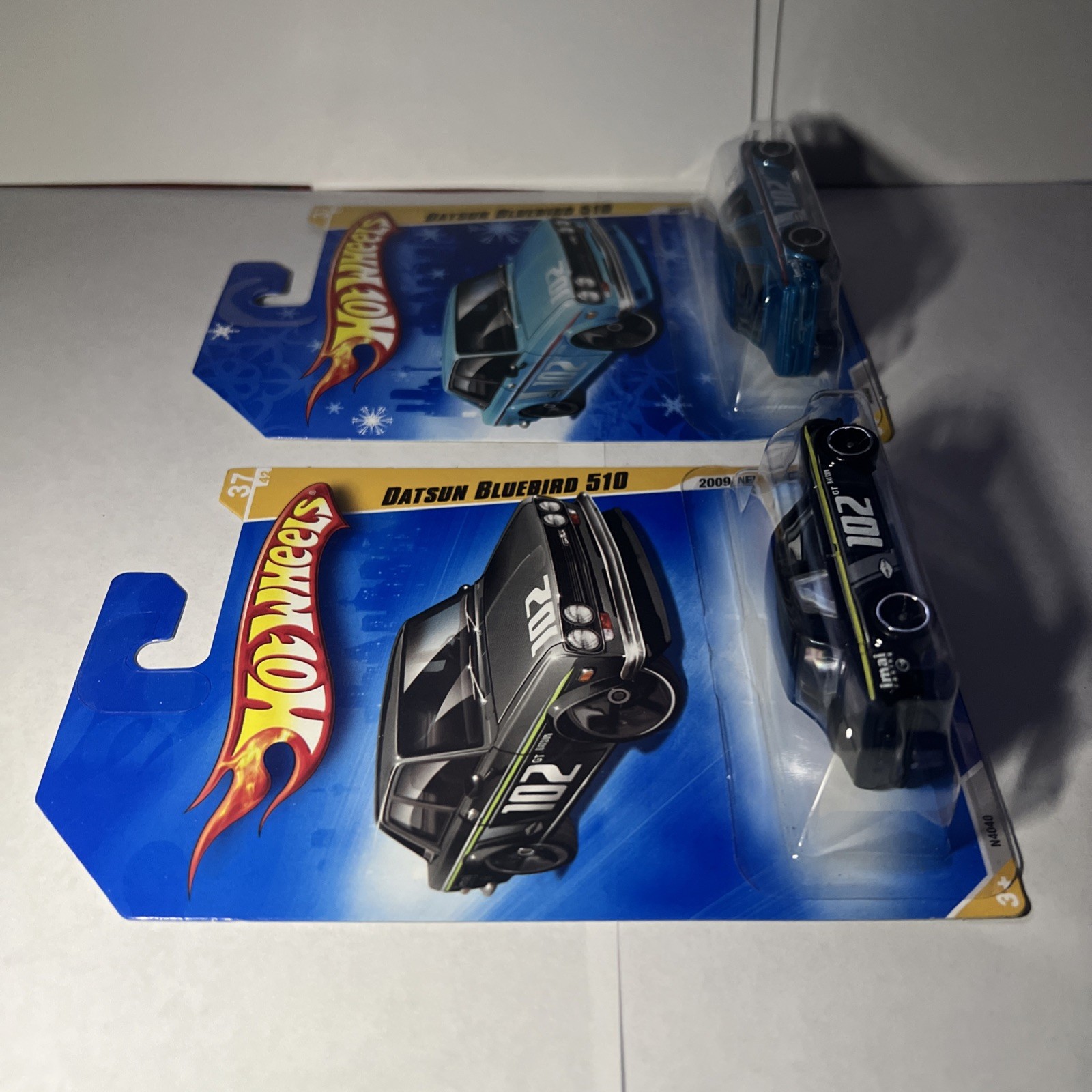 Hot Wheels 2009 Datson Bluebird 510 lot Blue + Black New Model ￼