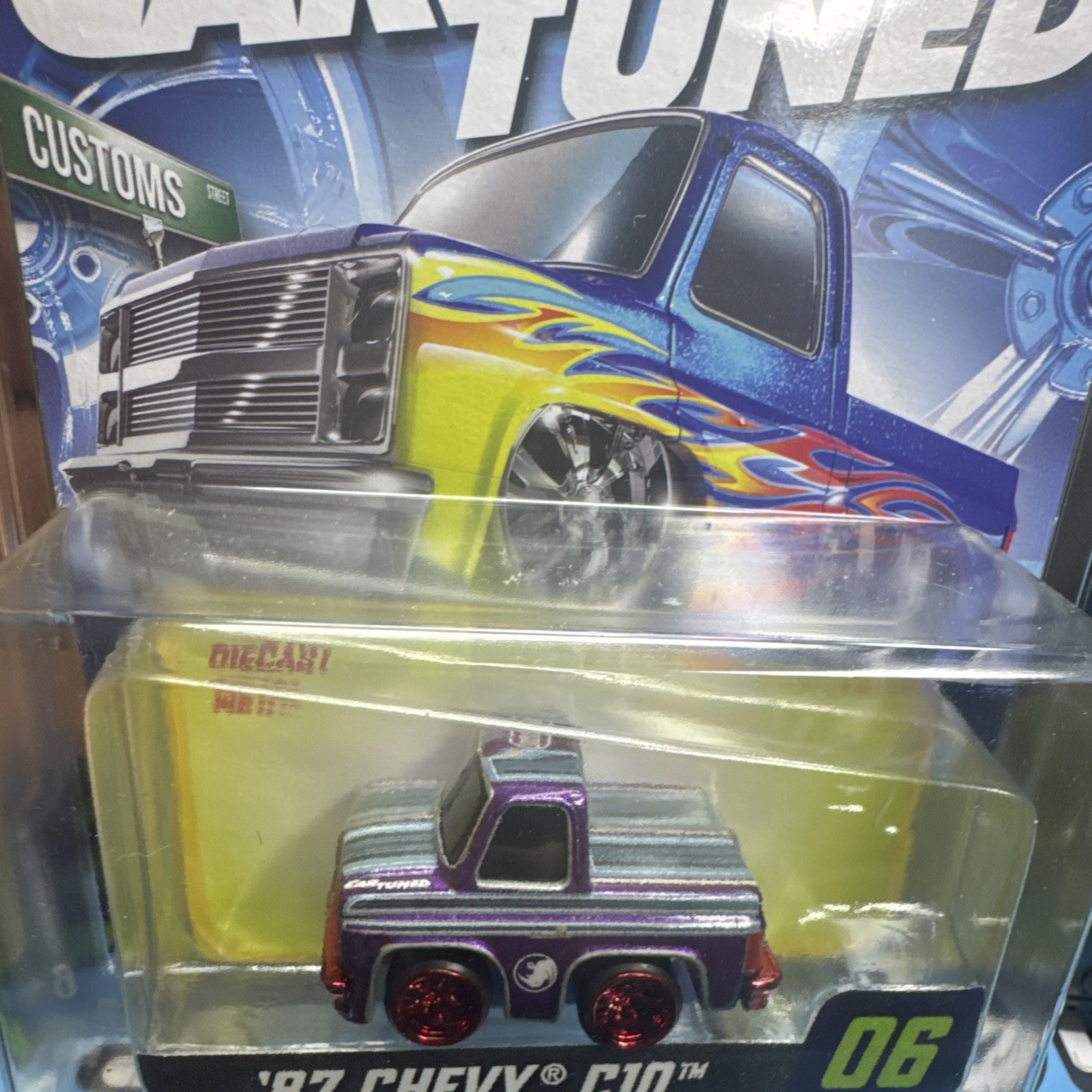 MGA Cartuned Series 1 1987 Chevy C10 Pickup #06 Diecast Purple (CHASE)