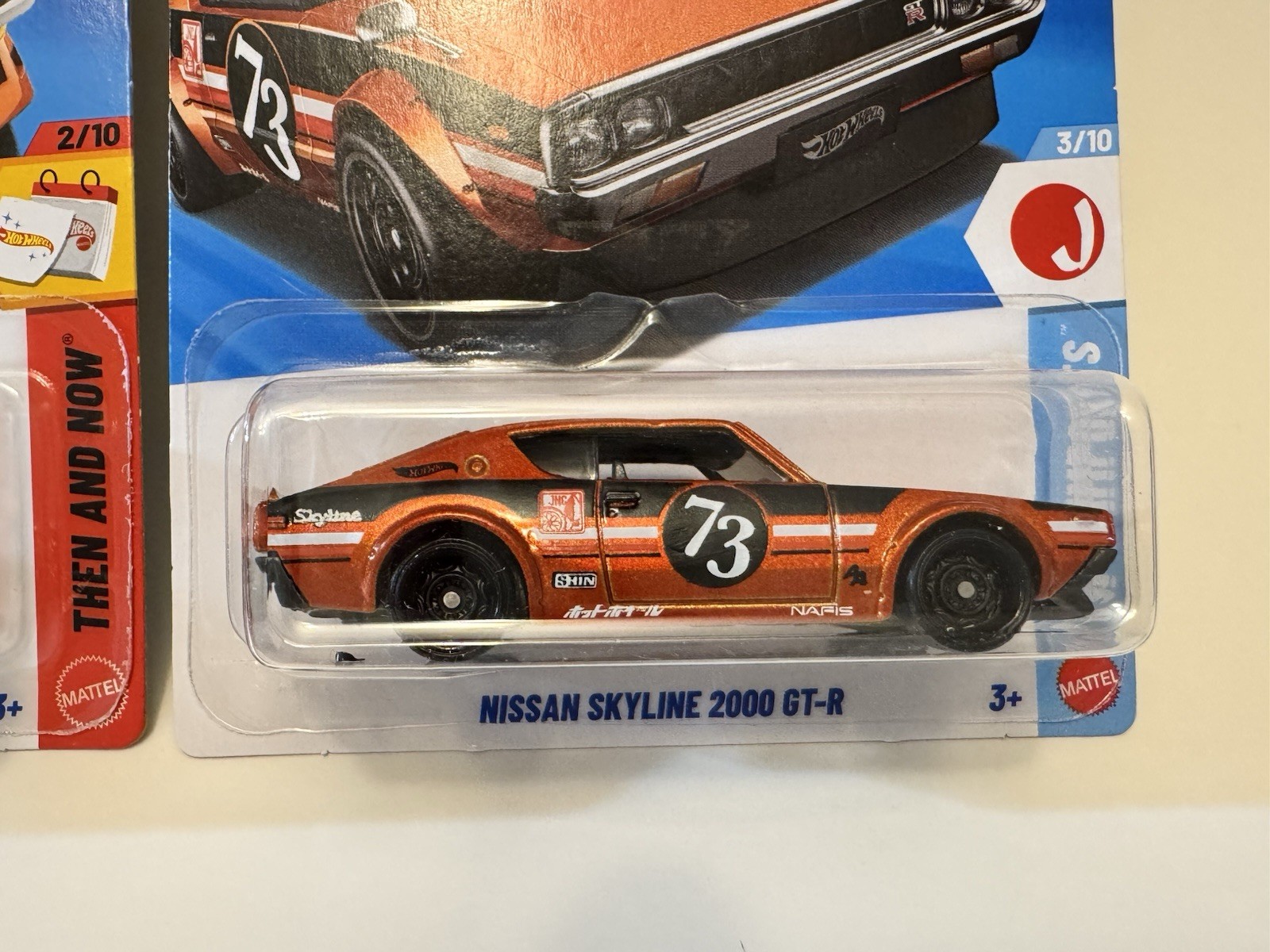 Hot Wheels JDM Nissan Skyline 2000GT-R + Fairlady Z Orange Then & Now – LOT OF 2
