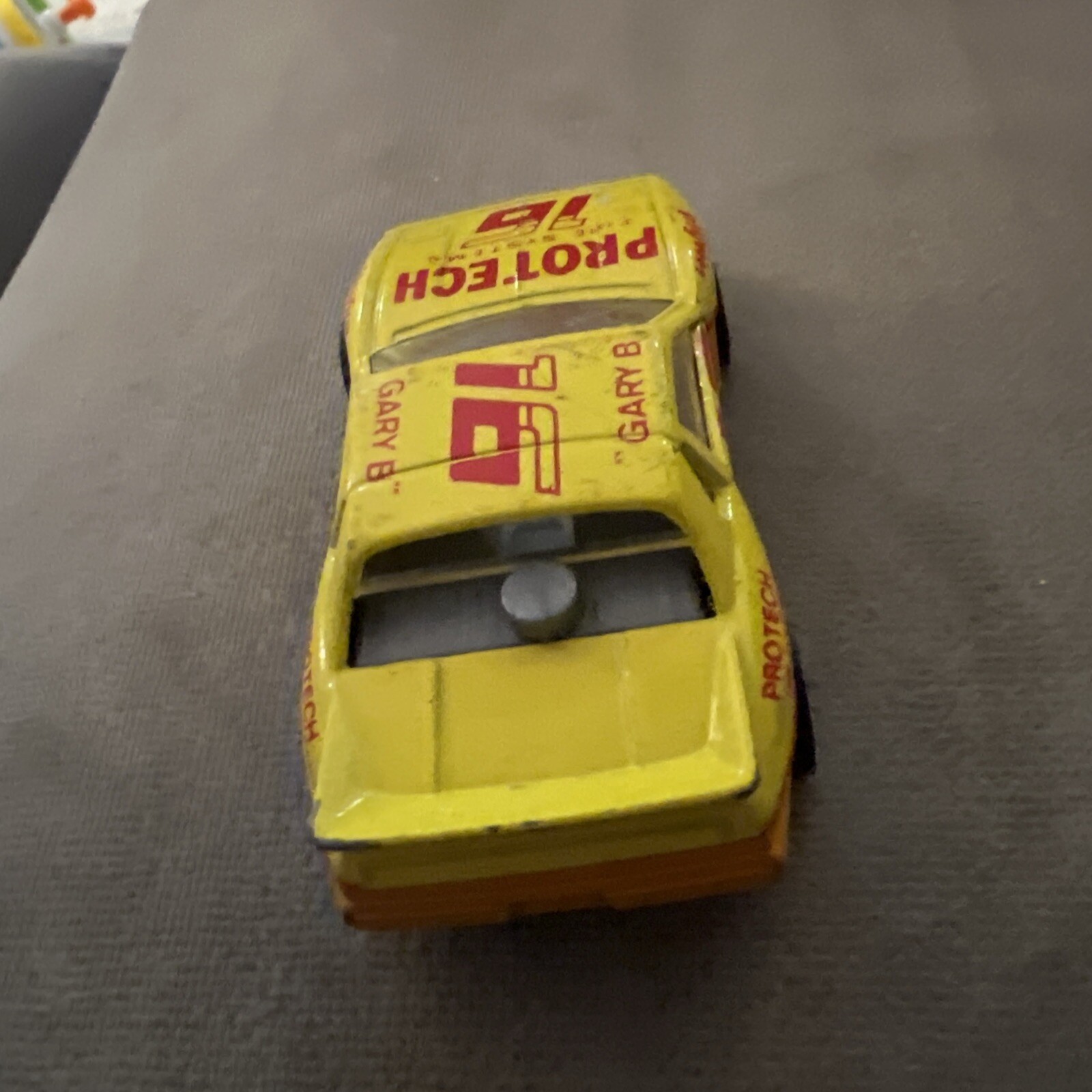 1985 Matchbox SuperFast SF19 Pontiac Fiero #16 ProTech Fire Systems Yellow LOOSE