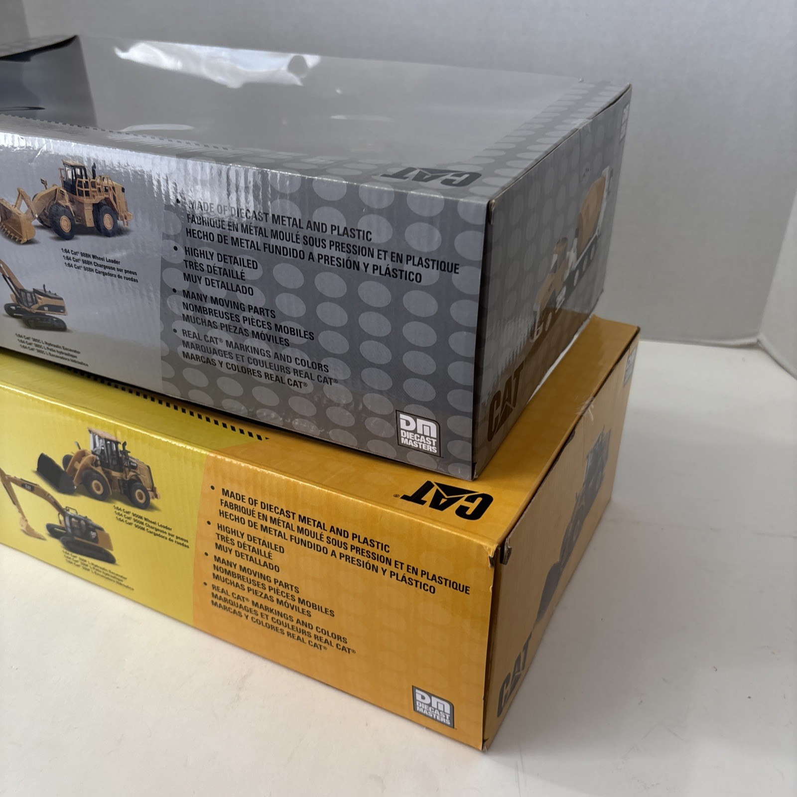 Diecast Masters 1:64 CATERPILLAR Metal Construction Trucks 2 Sets Of 4 – SEALED
