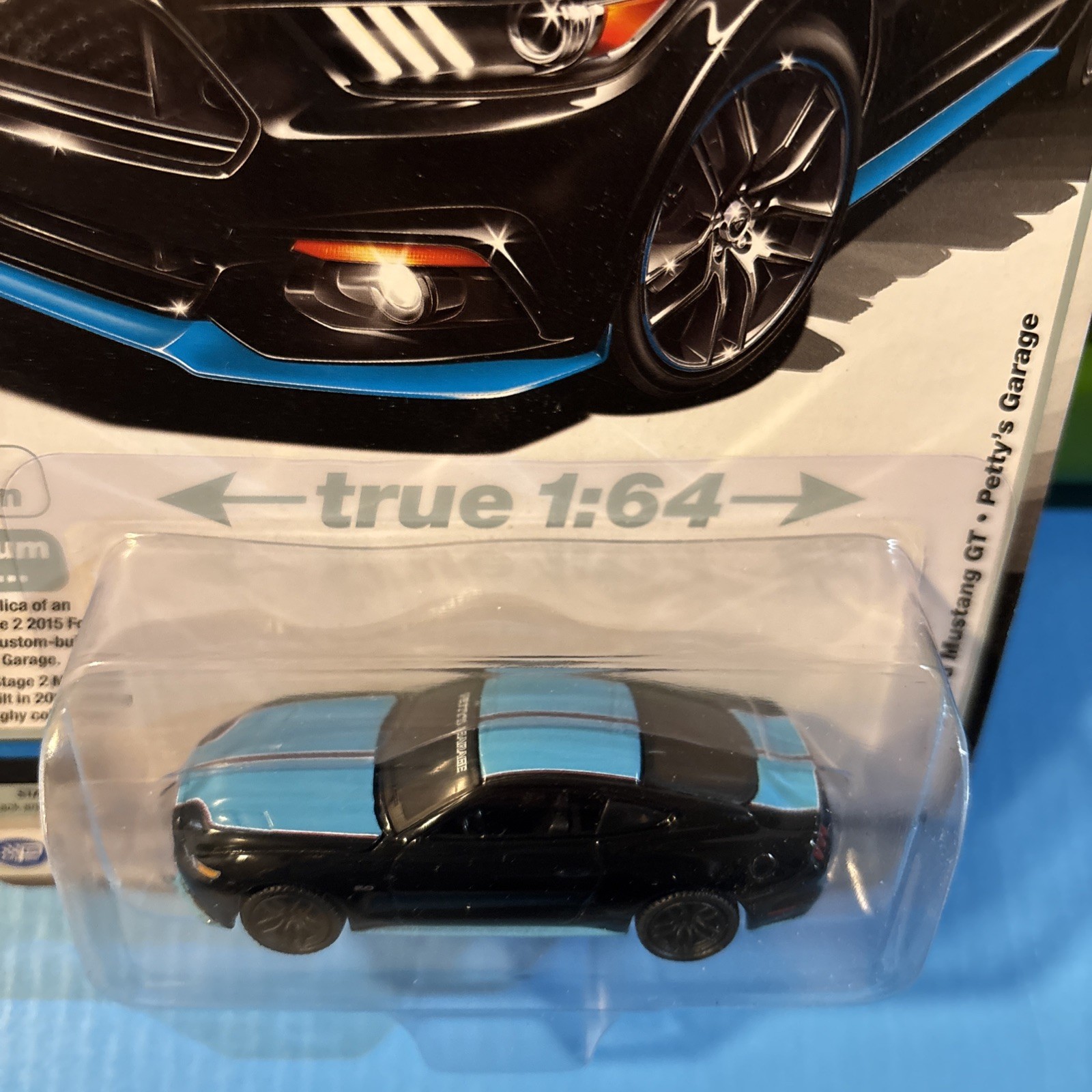 Auto World 2015 Ford Mustang GT Petty Garage *Black and Petty Blue*