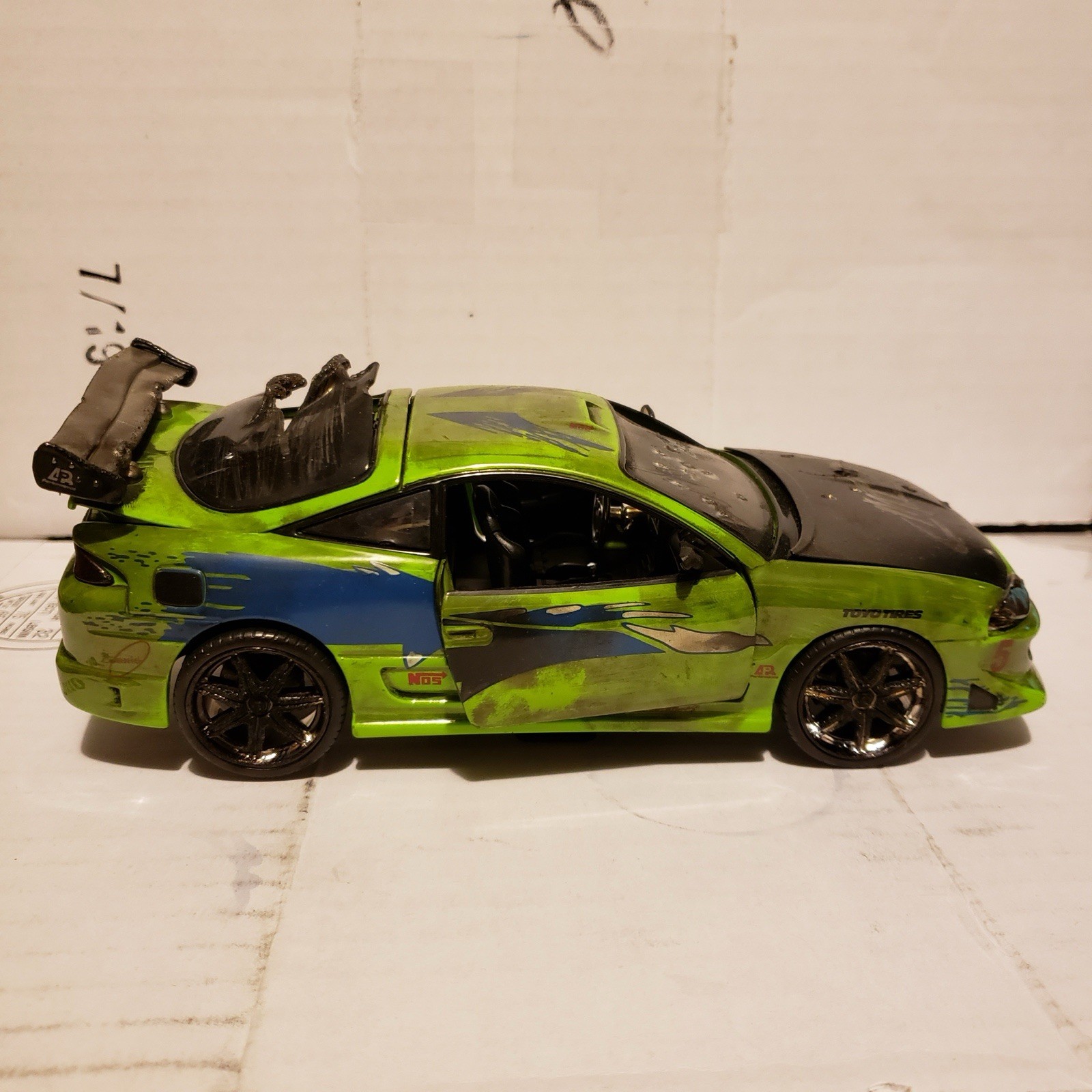 Jada Toys Tuned Diecast Model Car Green/Black/Blue w/ Large Rear Wing