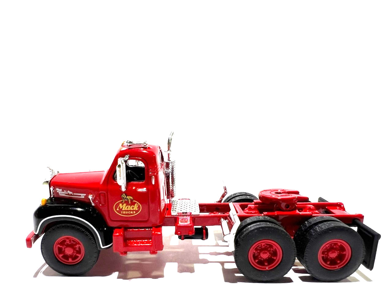 DCP / FIRST GEAR 1/64 SCALE B MODEL MACK DAY CAB, RED WITH BLACK FENDERS