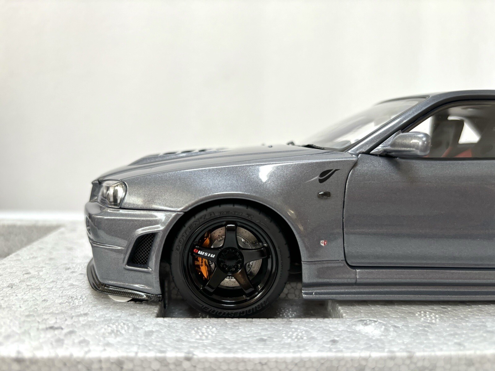 1/18 MotorHelix Nissan Skyline R34 GT-R Nismo Z-tune Gun Metallic Gray Diecast