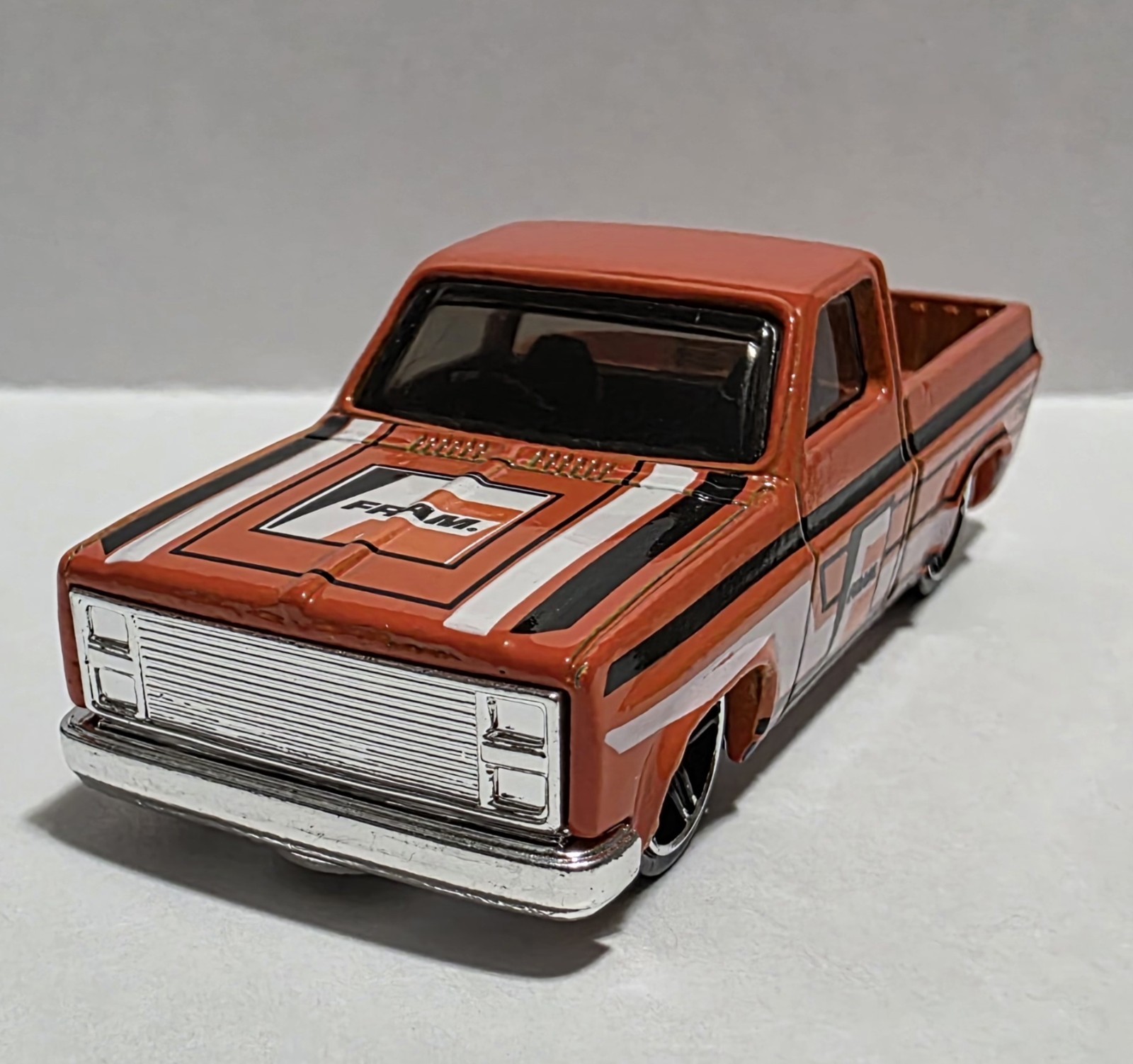 Hot Wheels 2015 HW City Orange Fram 83 Chevy Silverado
