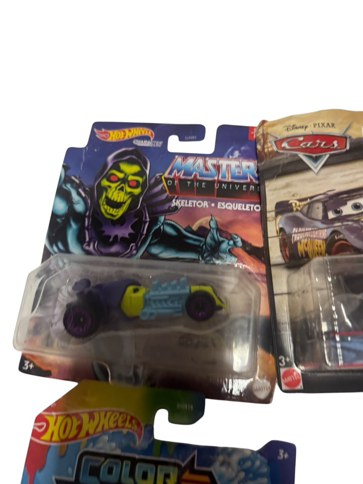 hot wheels mix lot of 4- see photos please-damaged package-new never used