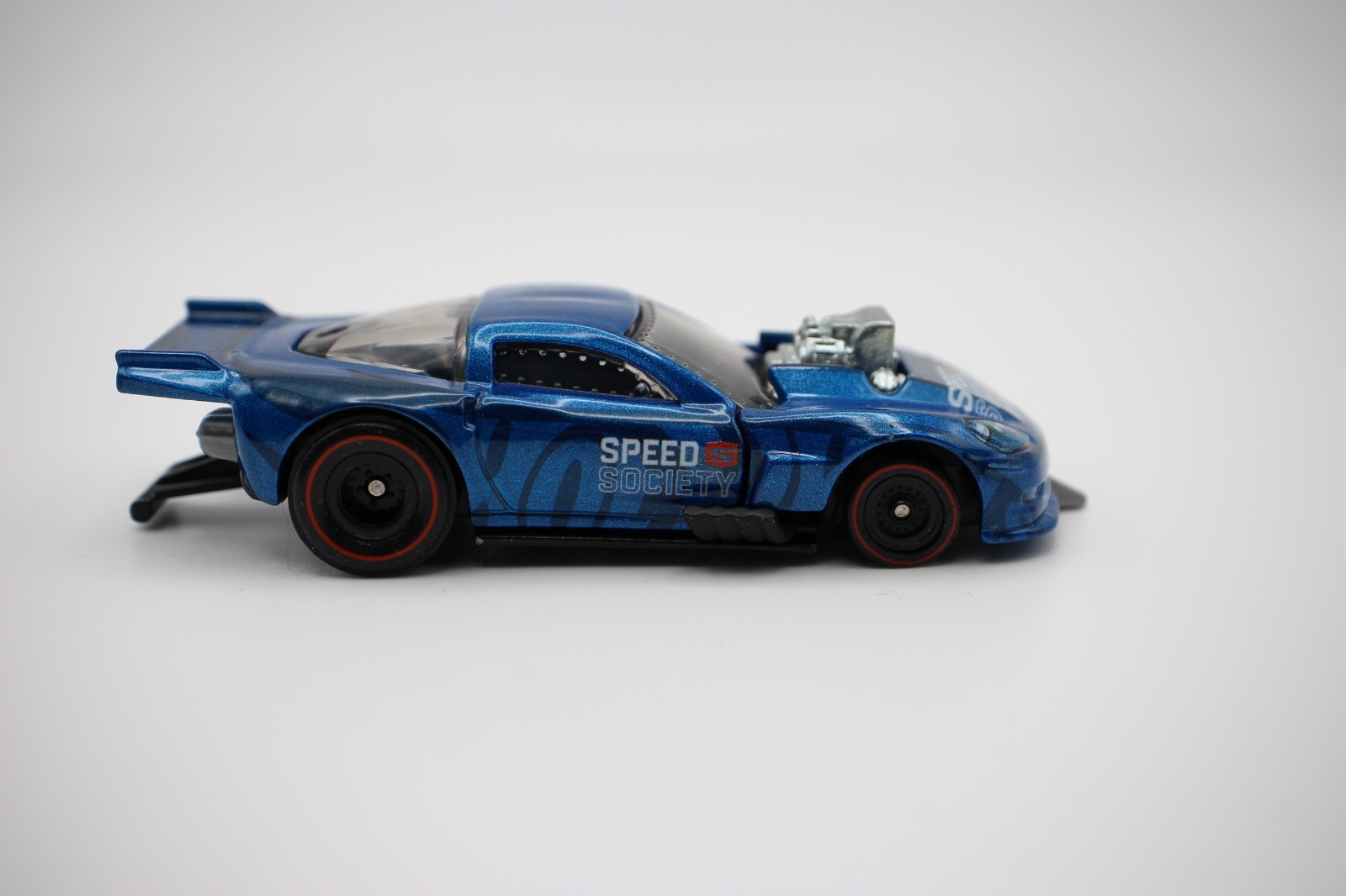 Hot Wheels ’12 Chevy Corvette Z06 Drag Racer Speed Society Blue 1:64 Loose 2021