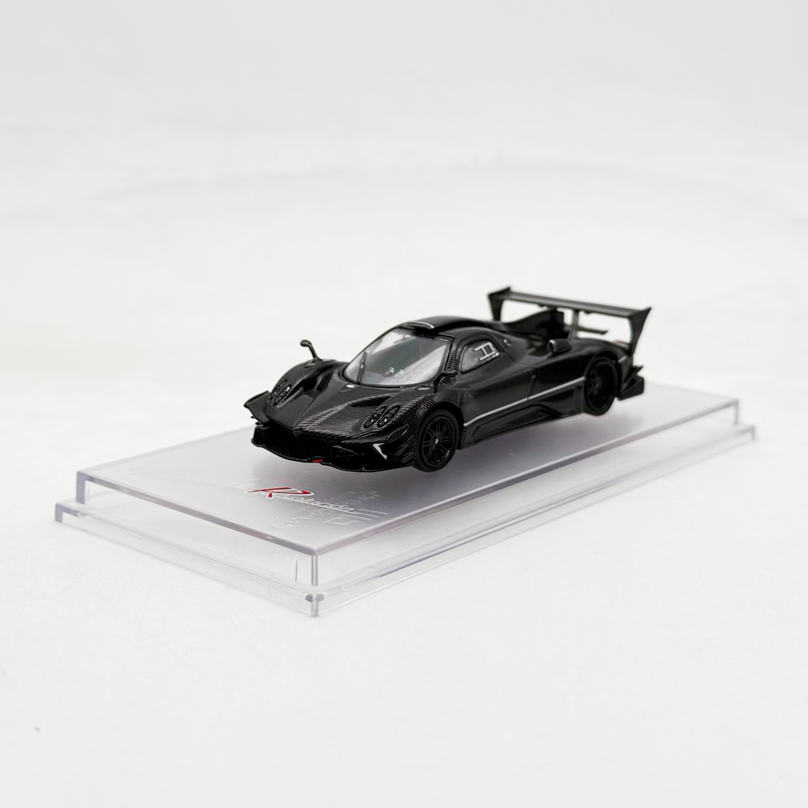 CM Model 1:64 Pagani Zonda Revolucion – Black Full Carbon – With Extra Wheels