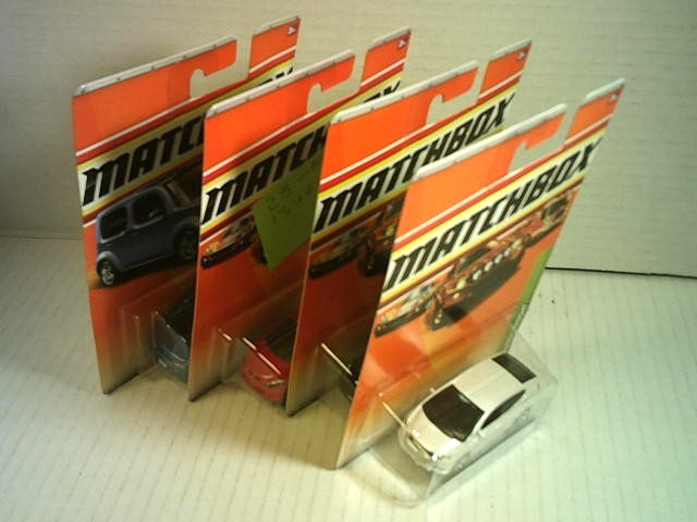 MATCHBOX NISSAN CUBE,TOYOTA PRIUS,HONDA INSIGHT,MAZDA 2= 4-CAR LOT, NEW, MIP