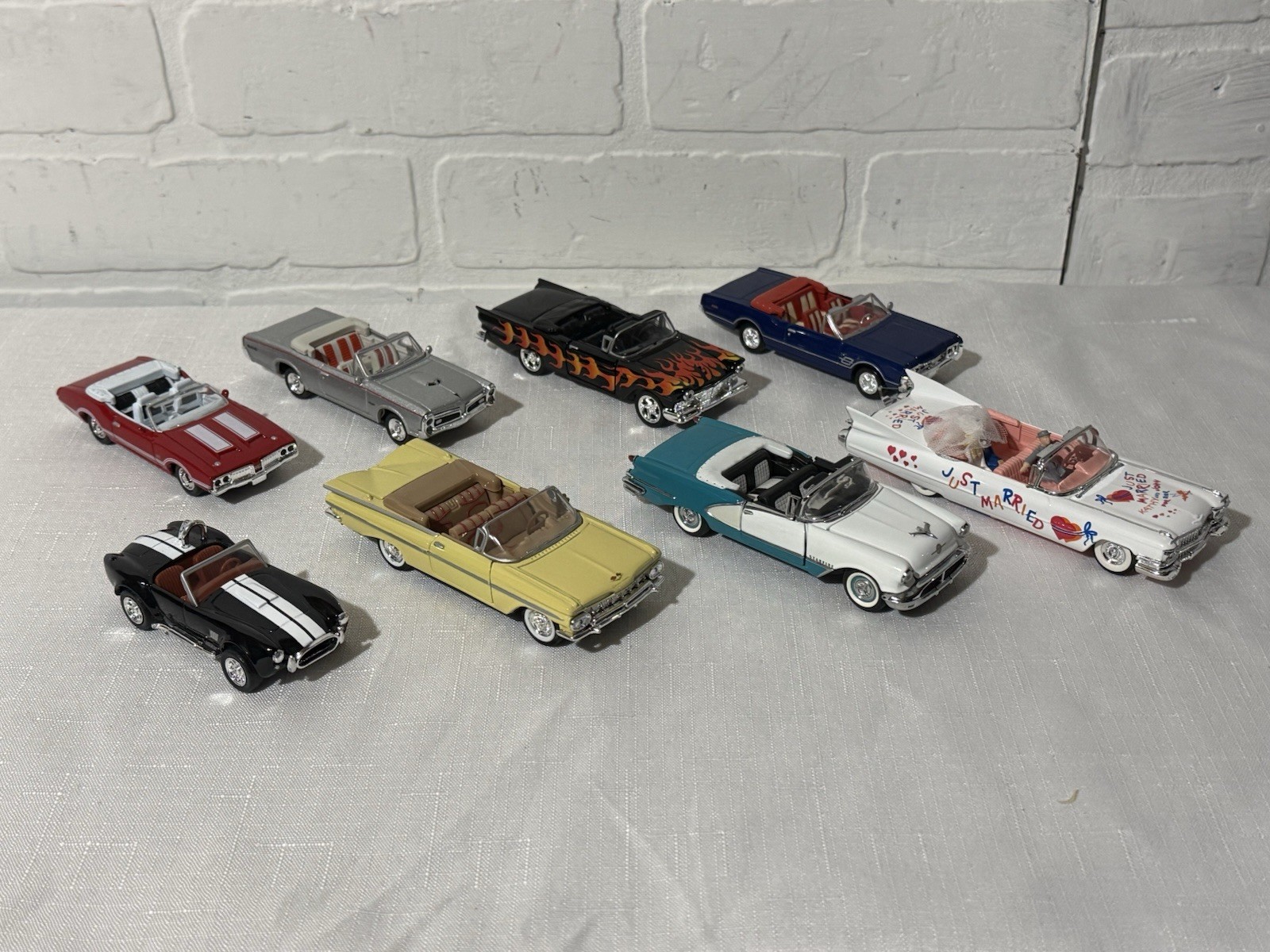Lot of 8 Mixed 1/43 Convertible’s GTO Olds Cobra Impala Ford Cadillac Married
