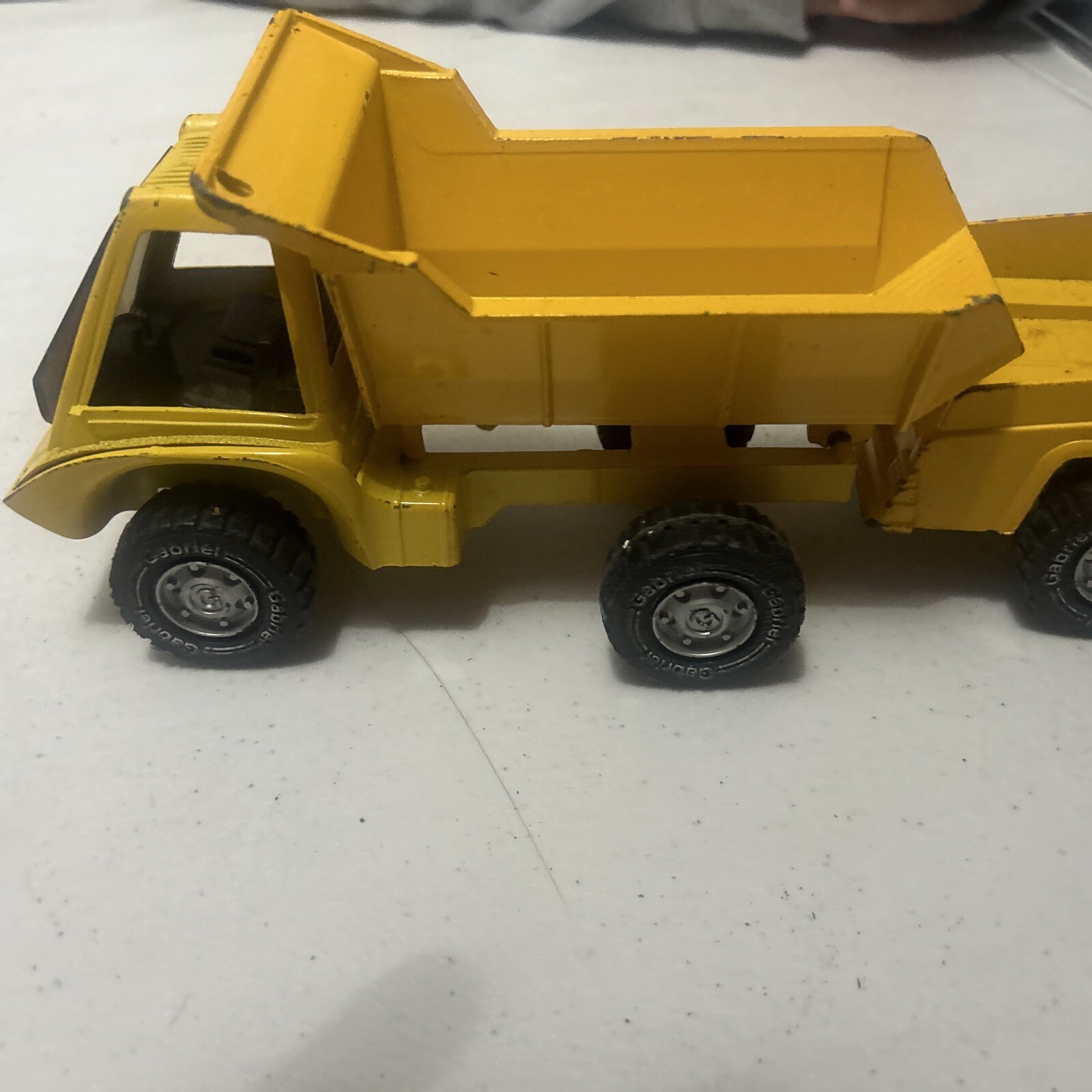 Vintage Gabriel Yellow pressed steel commercial trucks