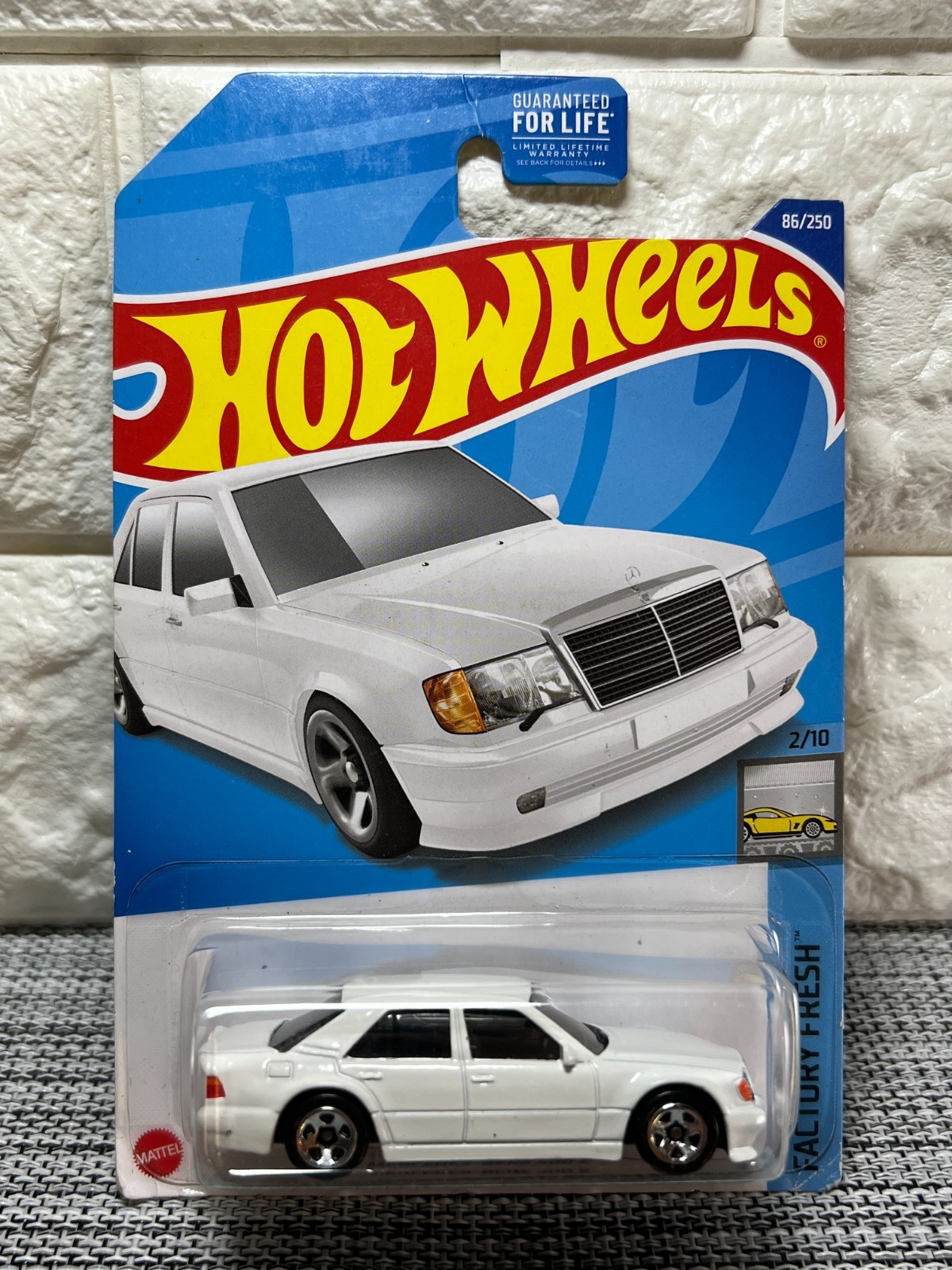 Hot Wheels Factory Fresh 2/10 Mercedes-Benz 500 E 86/250 Dollar General White