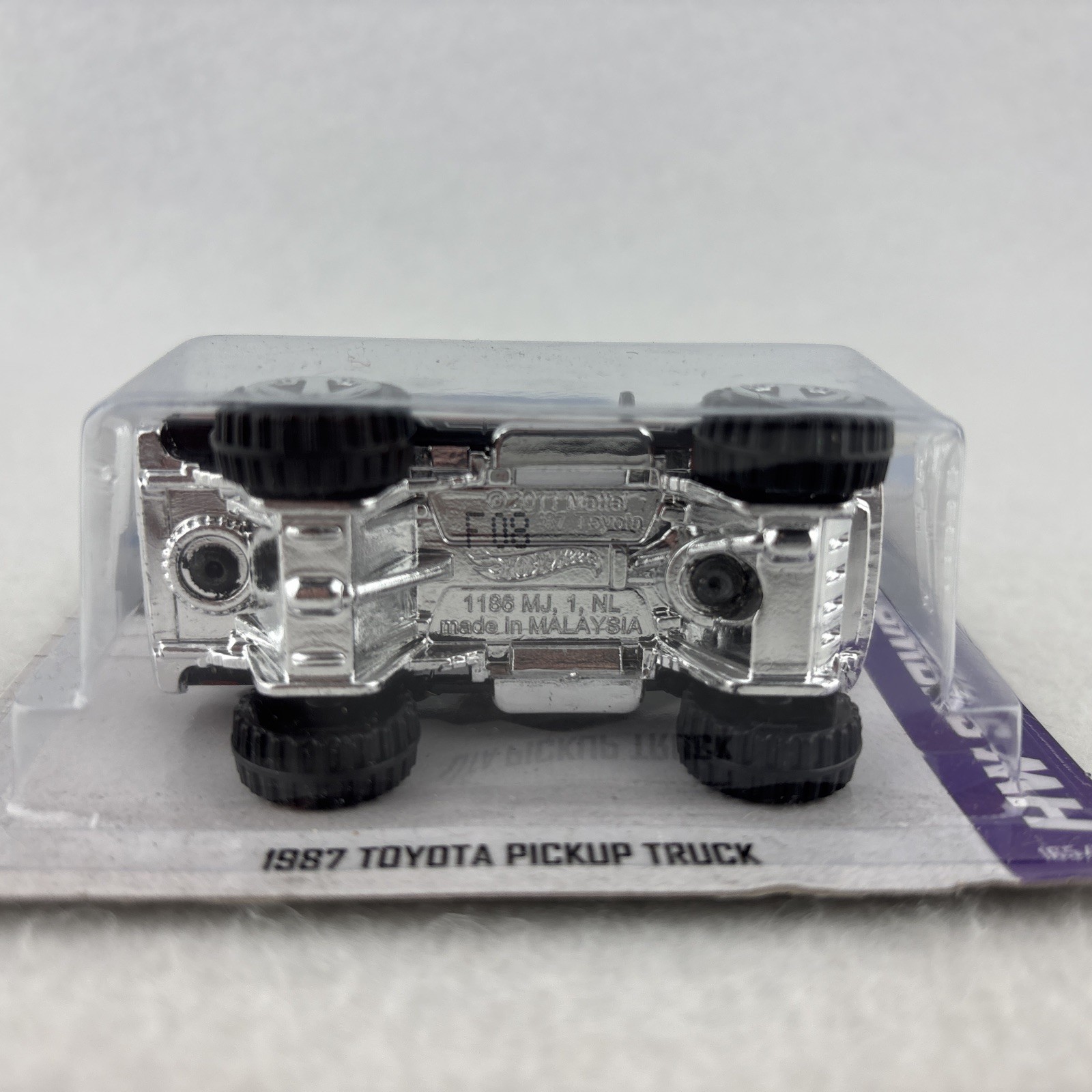 Hot Wheels HW Showroom Black 1987 Toyota Pickup Truck – Hot Trucks Series 2013