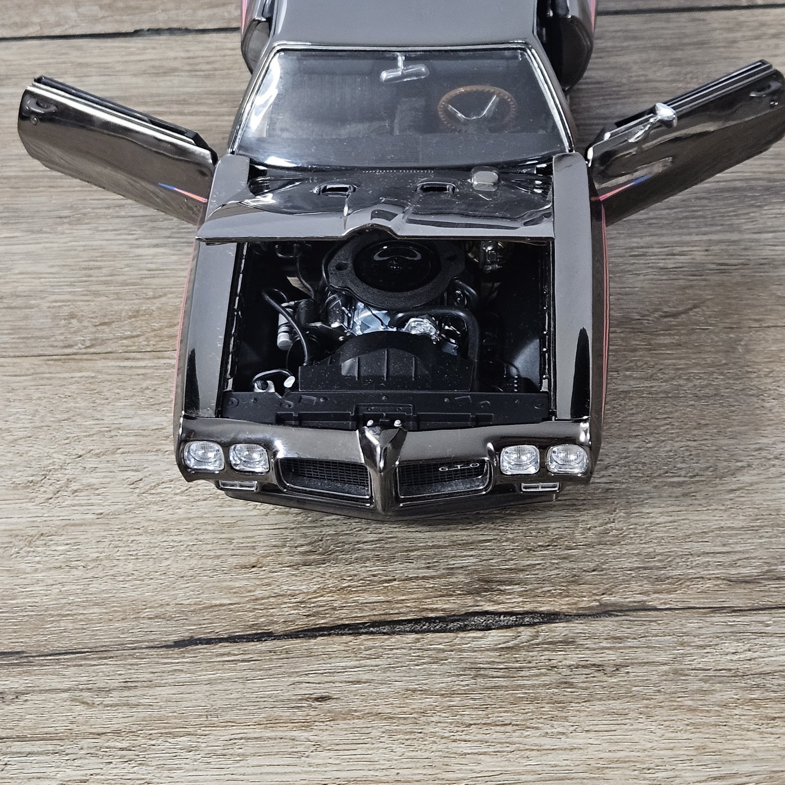 GMP 1970 Pontiac GTO Judge Black Chrome 1:18 Scale Diecast Opening Hood Doors