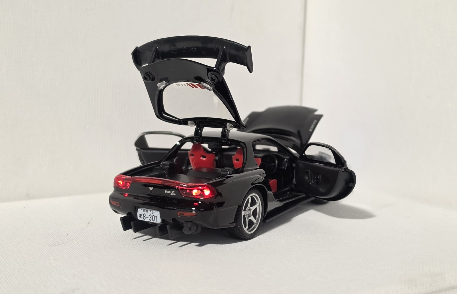 Mazda RX-7 Black Diecast Car 1:32 w/ Rear Wing Light-Up Highly Collectible