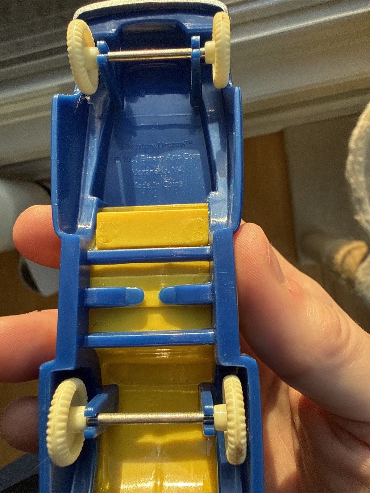 Dime store Dreams 2000 Blue And Yellow Plastic Car