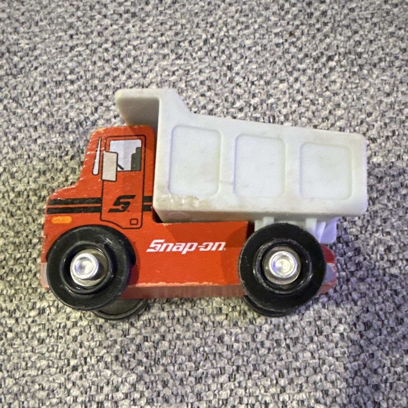 Snap-on Red Wooden dump truck with a Gray plastic dump bed.