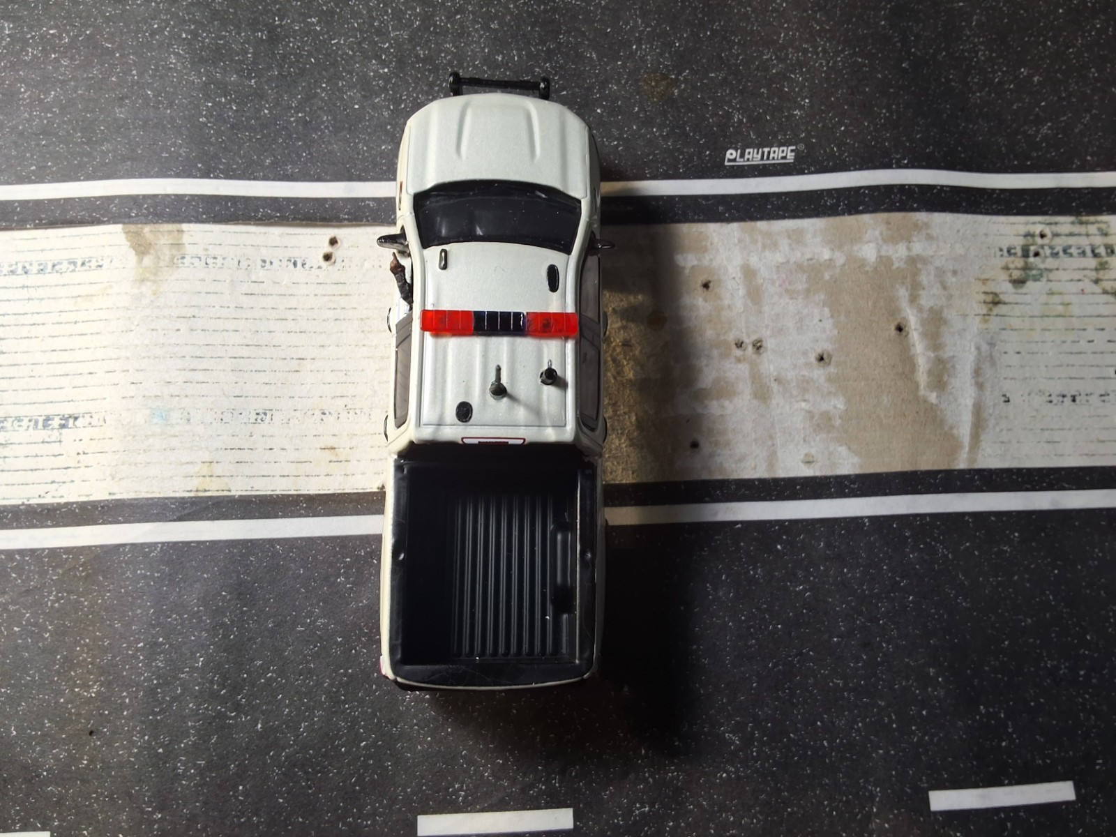 Greenlight Police Custom 1/64 Chevy Silverado SSV with Police Officer Driving