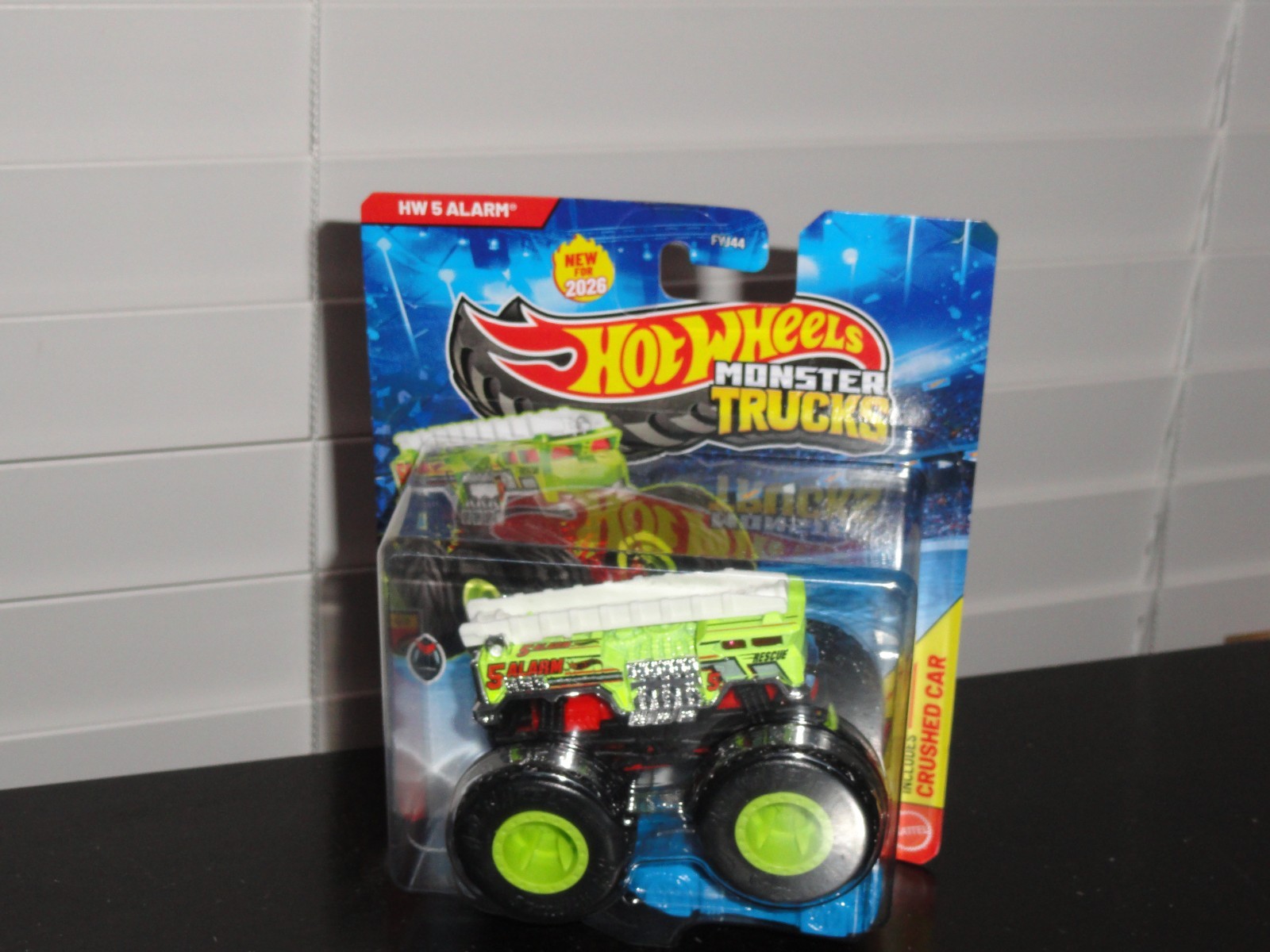 HOT WHEELS 2026 MONSTER TRUCKS CHAMPION CRASHERS 6/8 HW 5 ALARM (GREEN) DIECAST