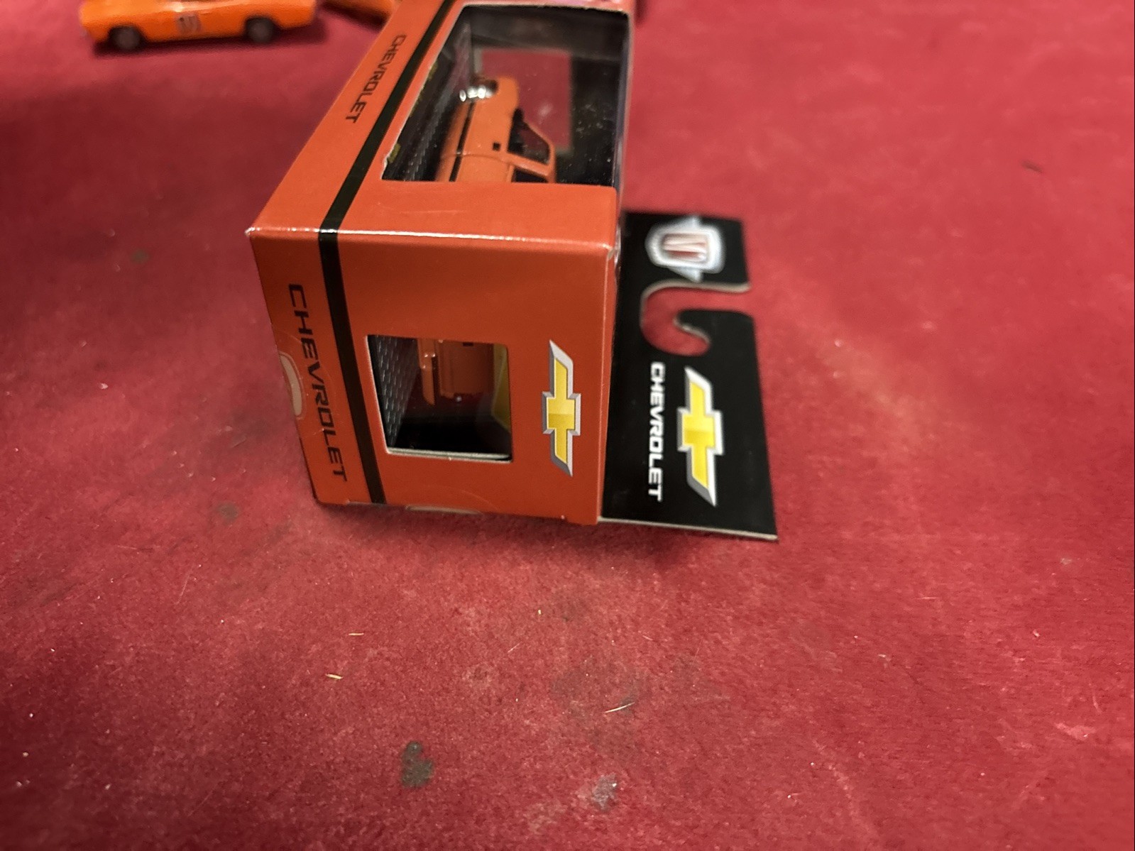 M2 Machines Chevrolet Orange Diecast Pickup Truck 1:64 Scale 14+ Years Boxed