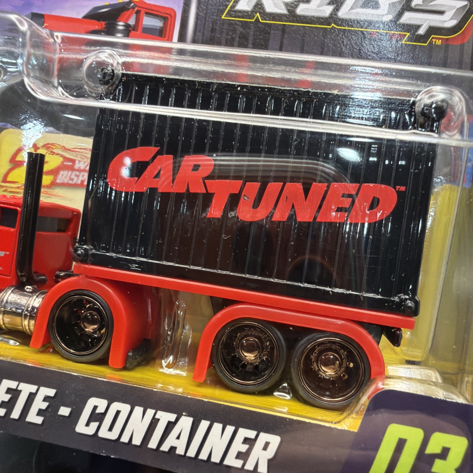 Car Tuned RIGS Series 3 – Sneaky Pete Container #03 – Red W/ Black Container