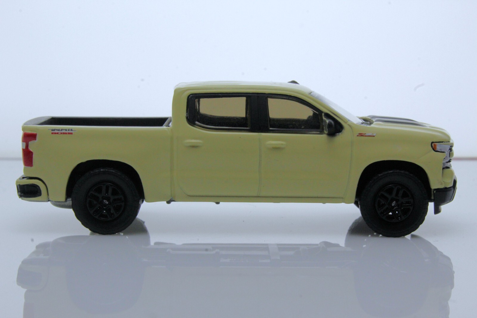 2023 Chevy Silverado 1500 Trail Boss Off-Road Pickup Truck 164 Diecast Model Tan